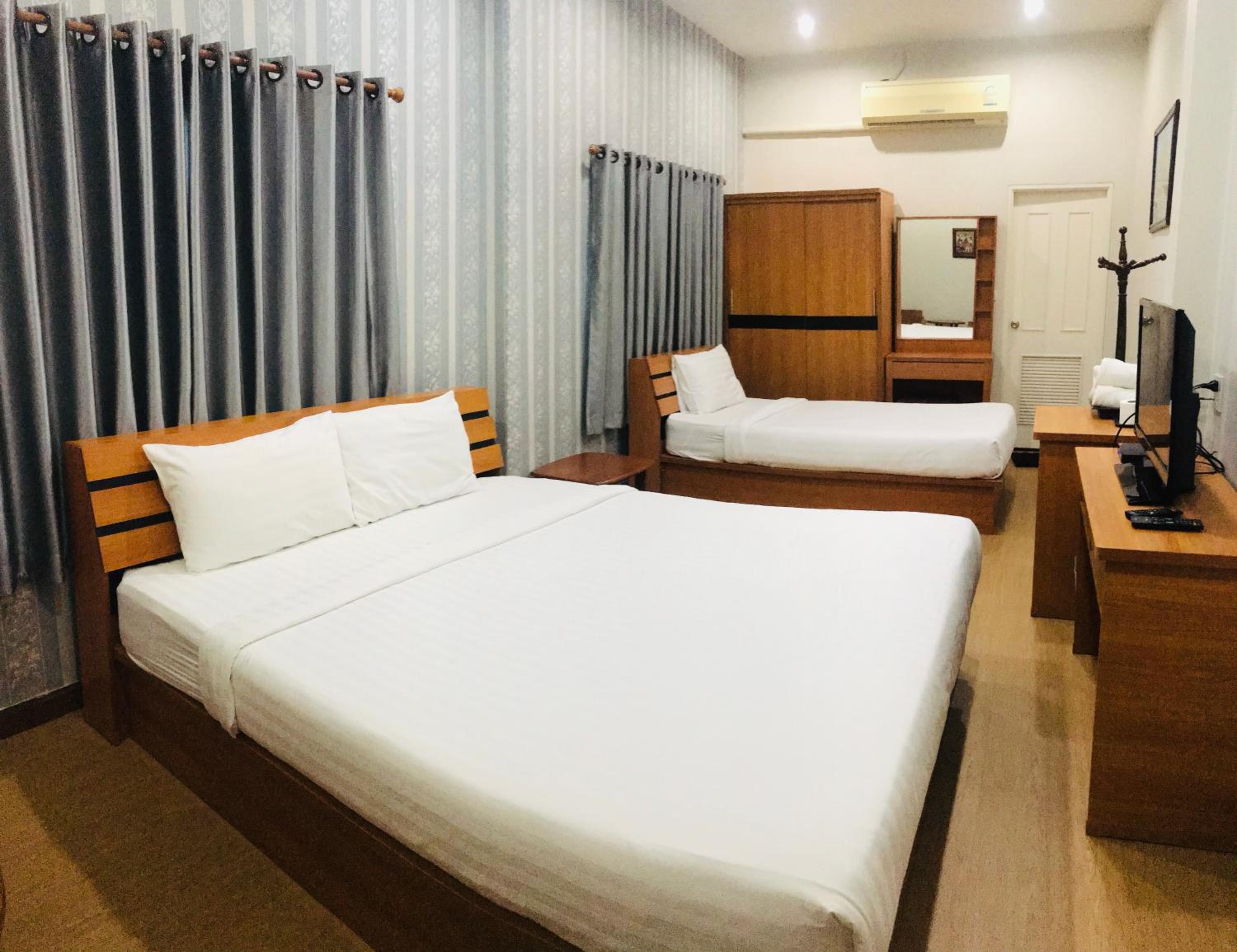 Standard Triple Room - Photo 1