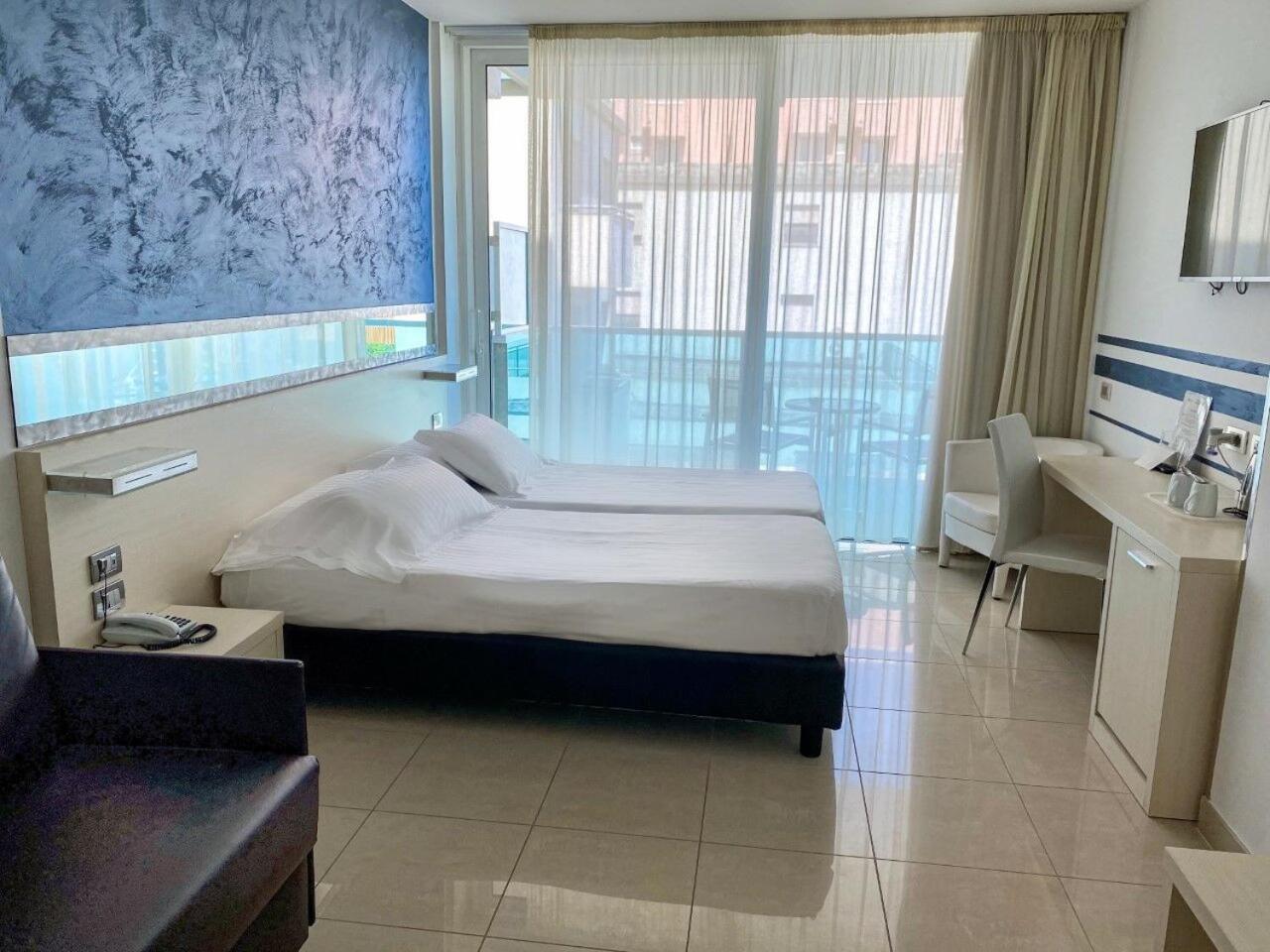 Superior Twin Room with Balcony and Side Sea View - Photo 1
