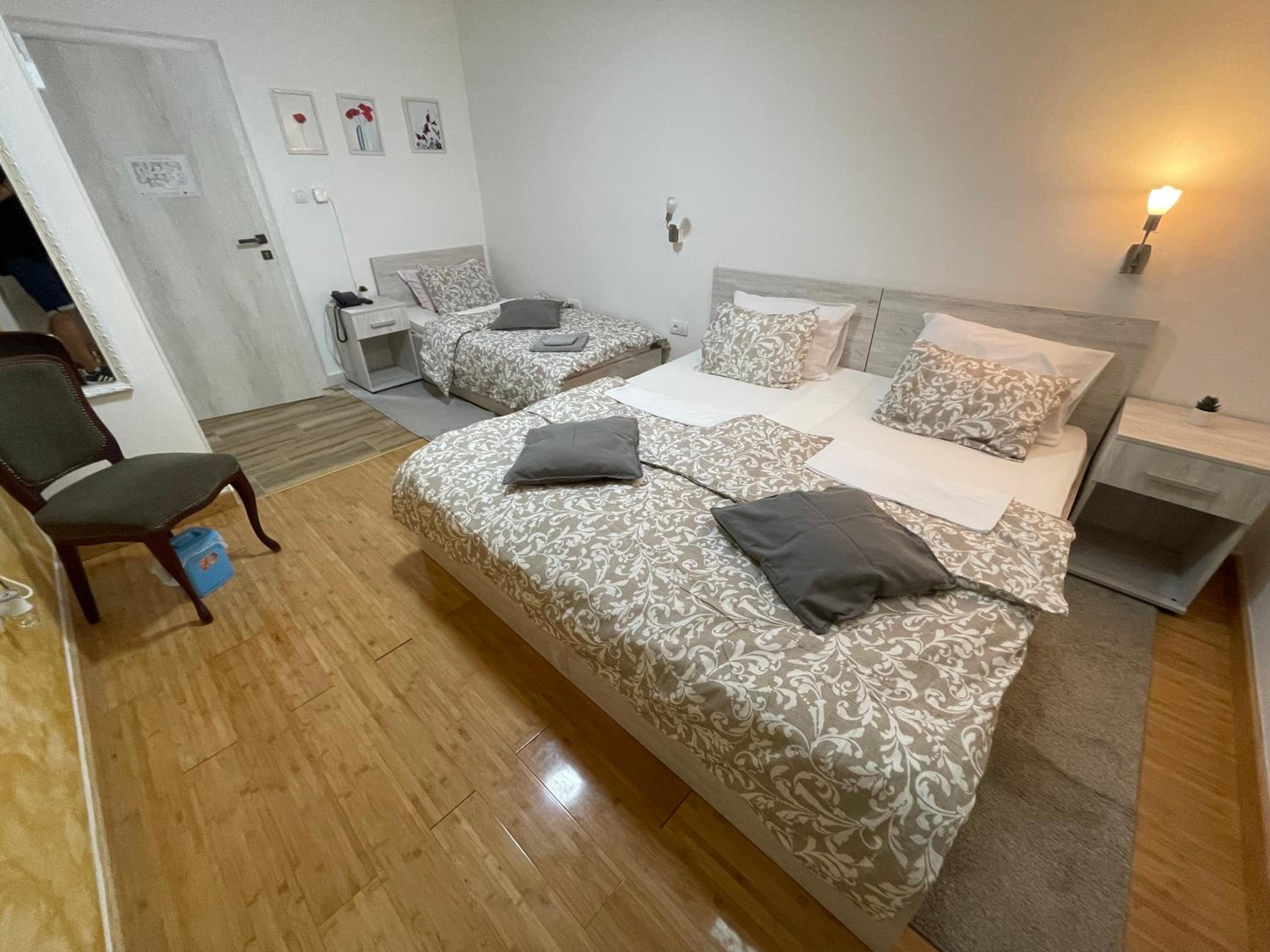 Deluxe Triple Room - Photo 7