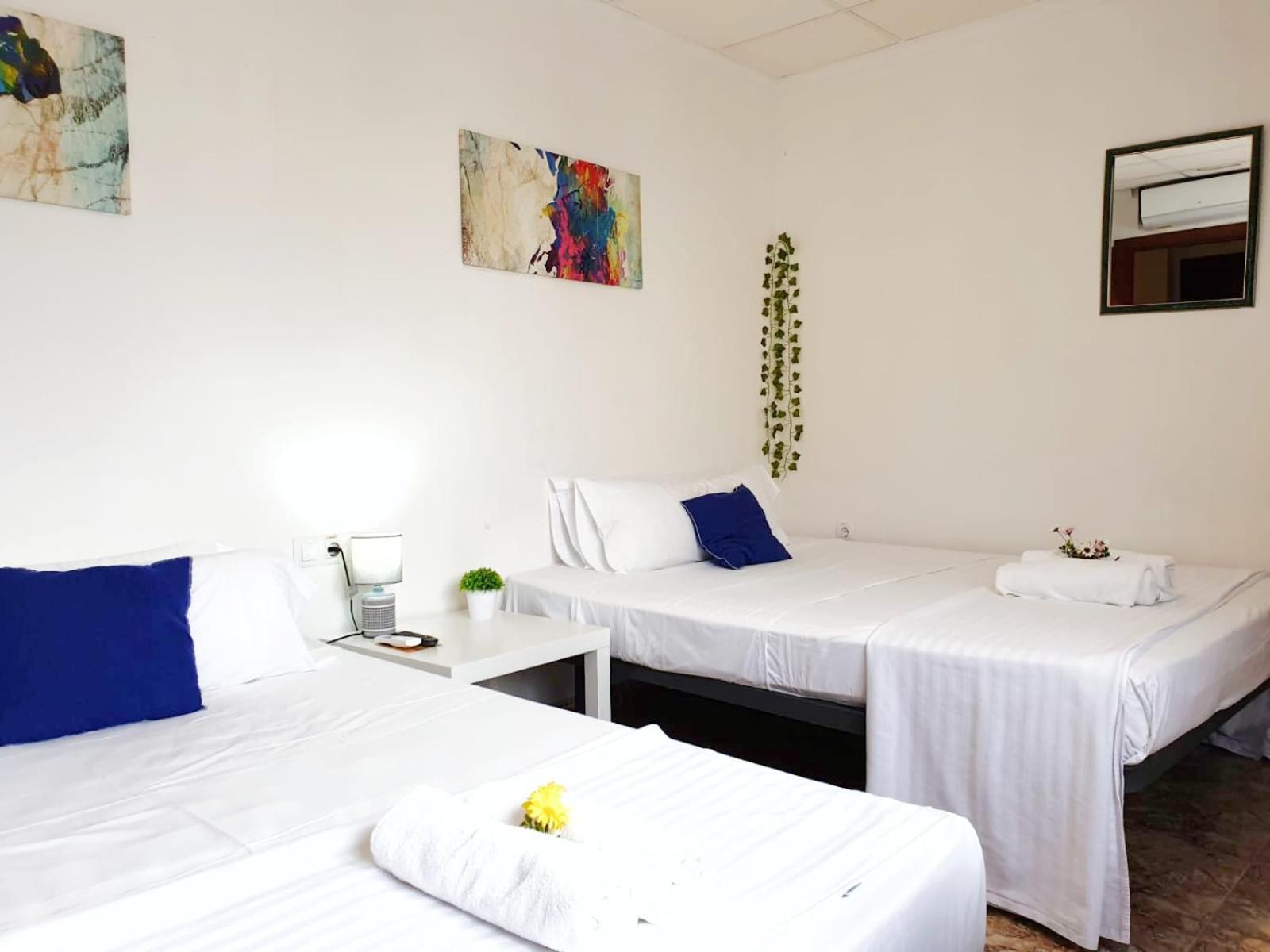 Quadruple Room with Private Bathroom - Photo 1