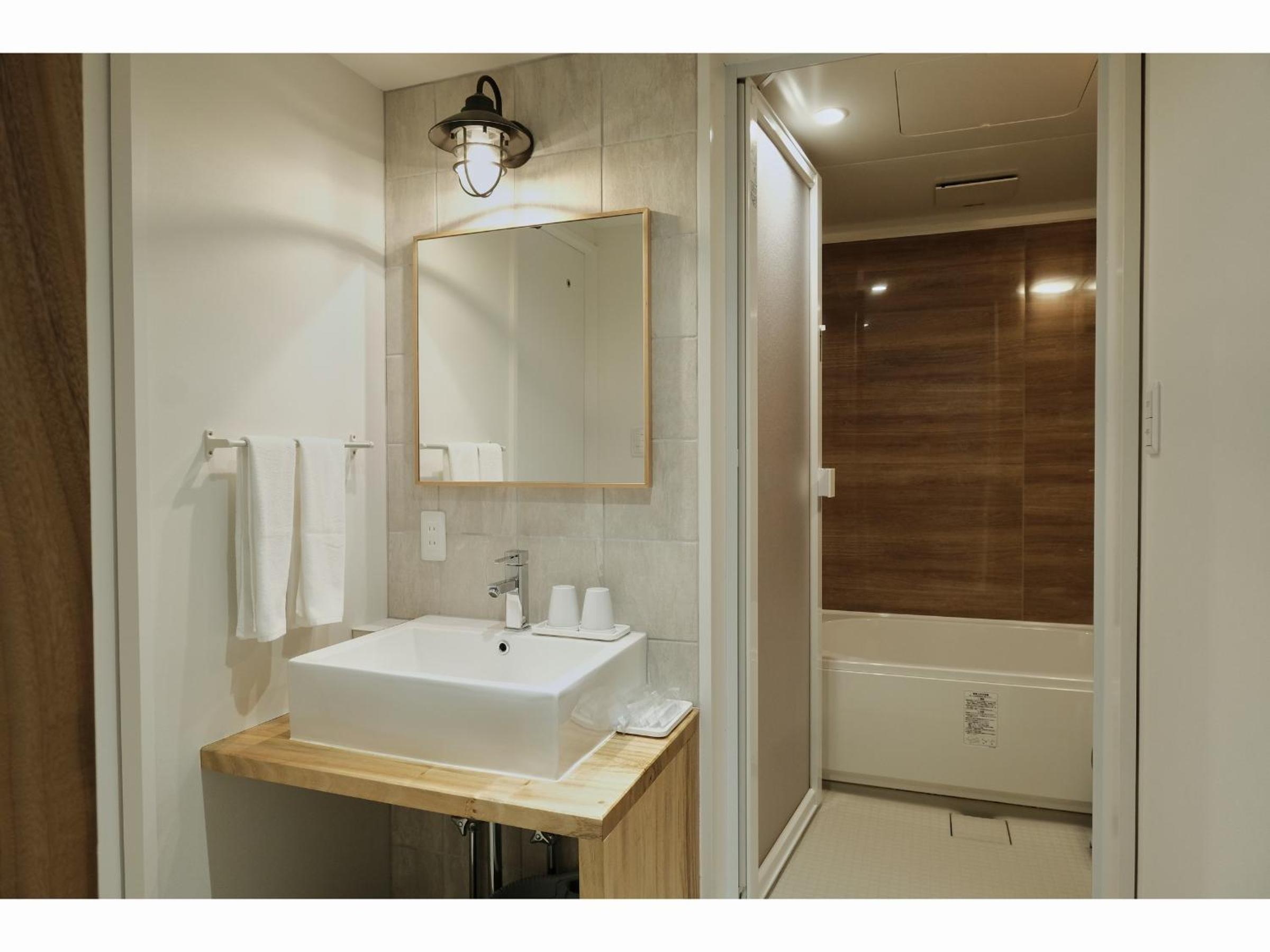 Deluxe Twin Room - Photo 7