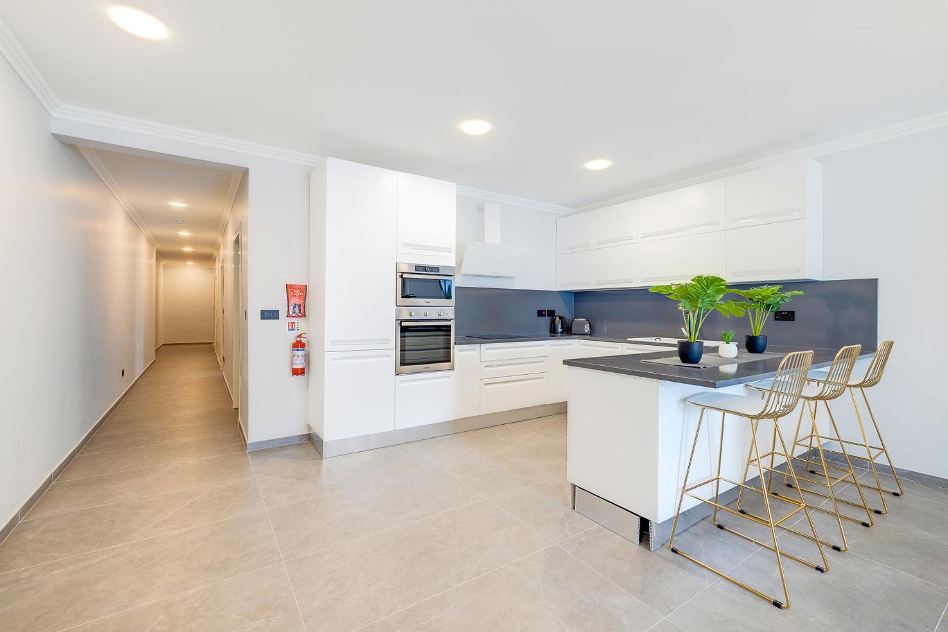 Three-Bedroom Apartment - Photo 4