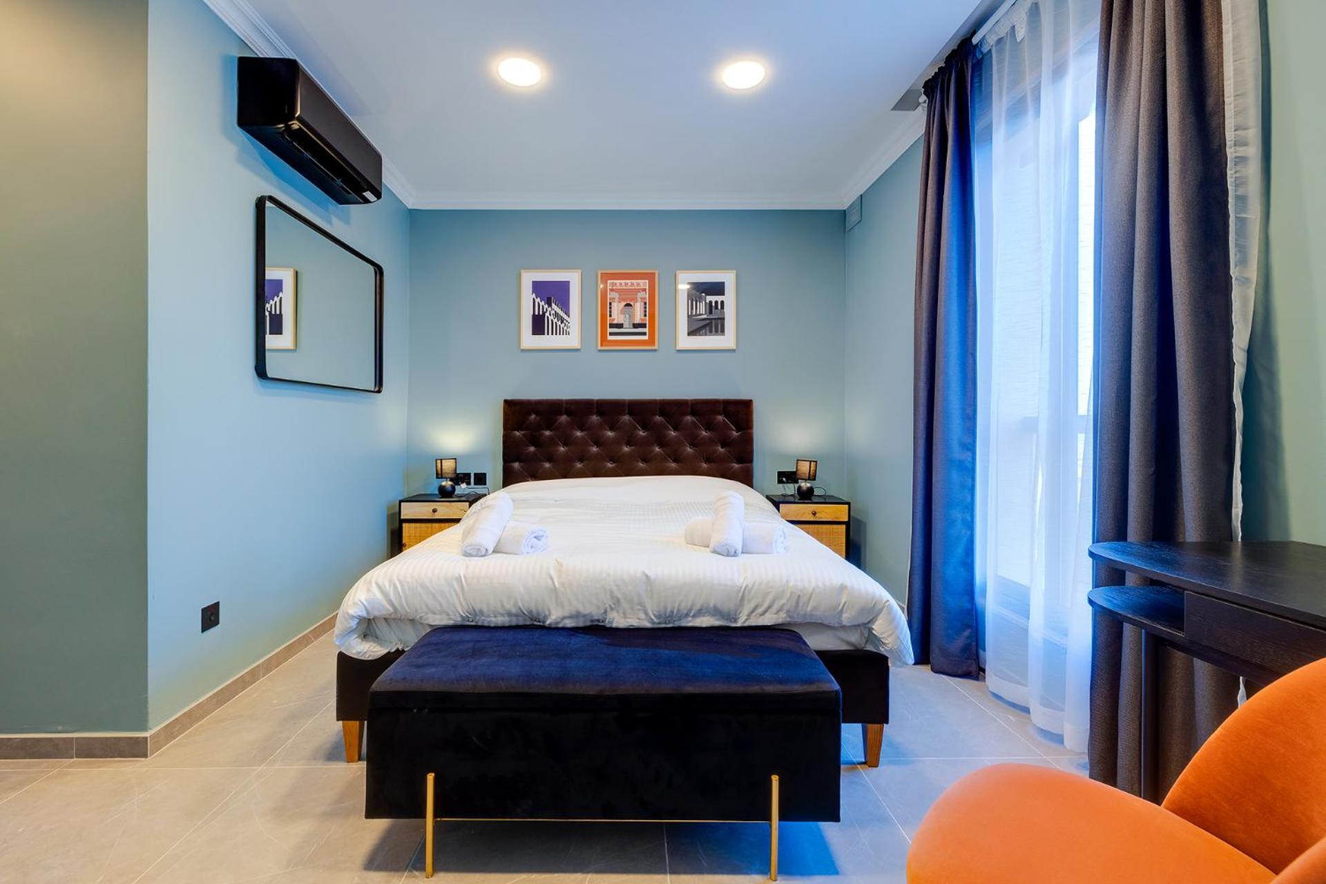 Three-Bedroom Apartment - Photo 11