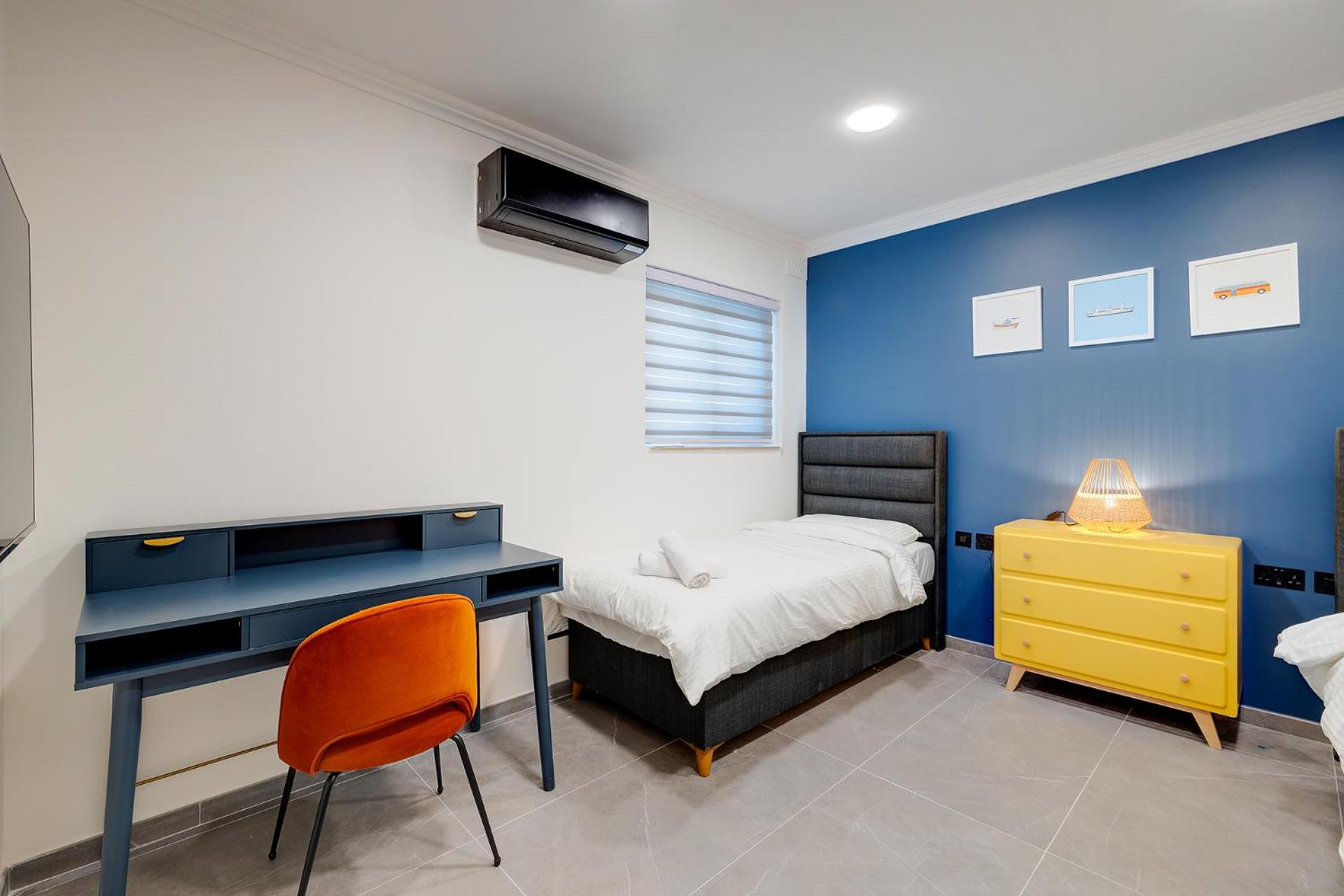 Three-Bedroom Apartment - Photo 18
