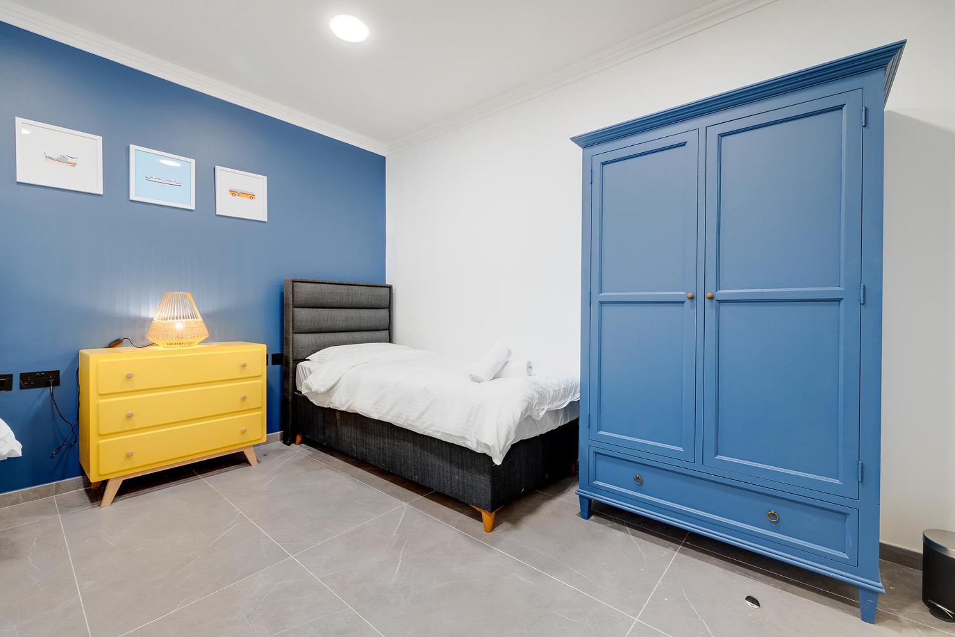 Three-Bedroom Apartment - Photo 19