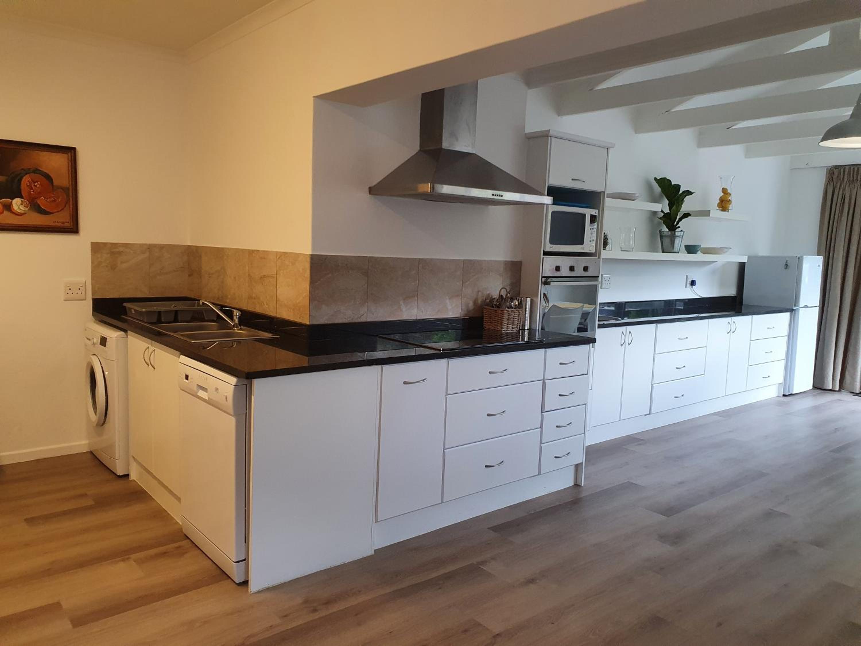 Three-Bedroom House - Photo 26