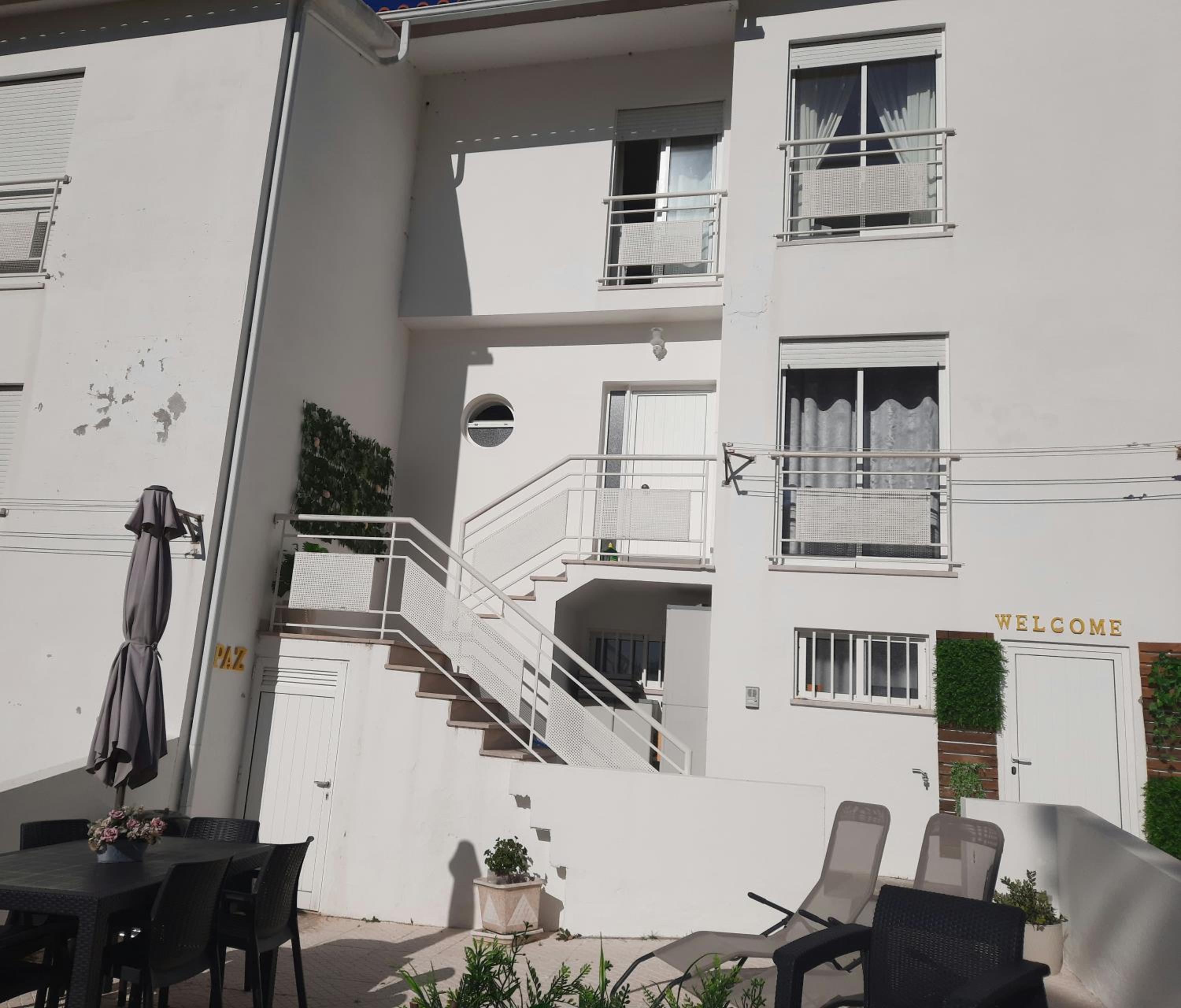 Three-Bedroom House - Photo 47