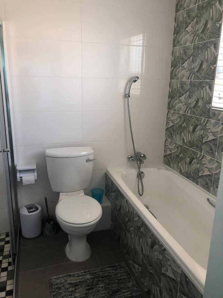 Three-Bedroom House - Photo 16
