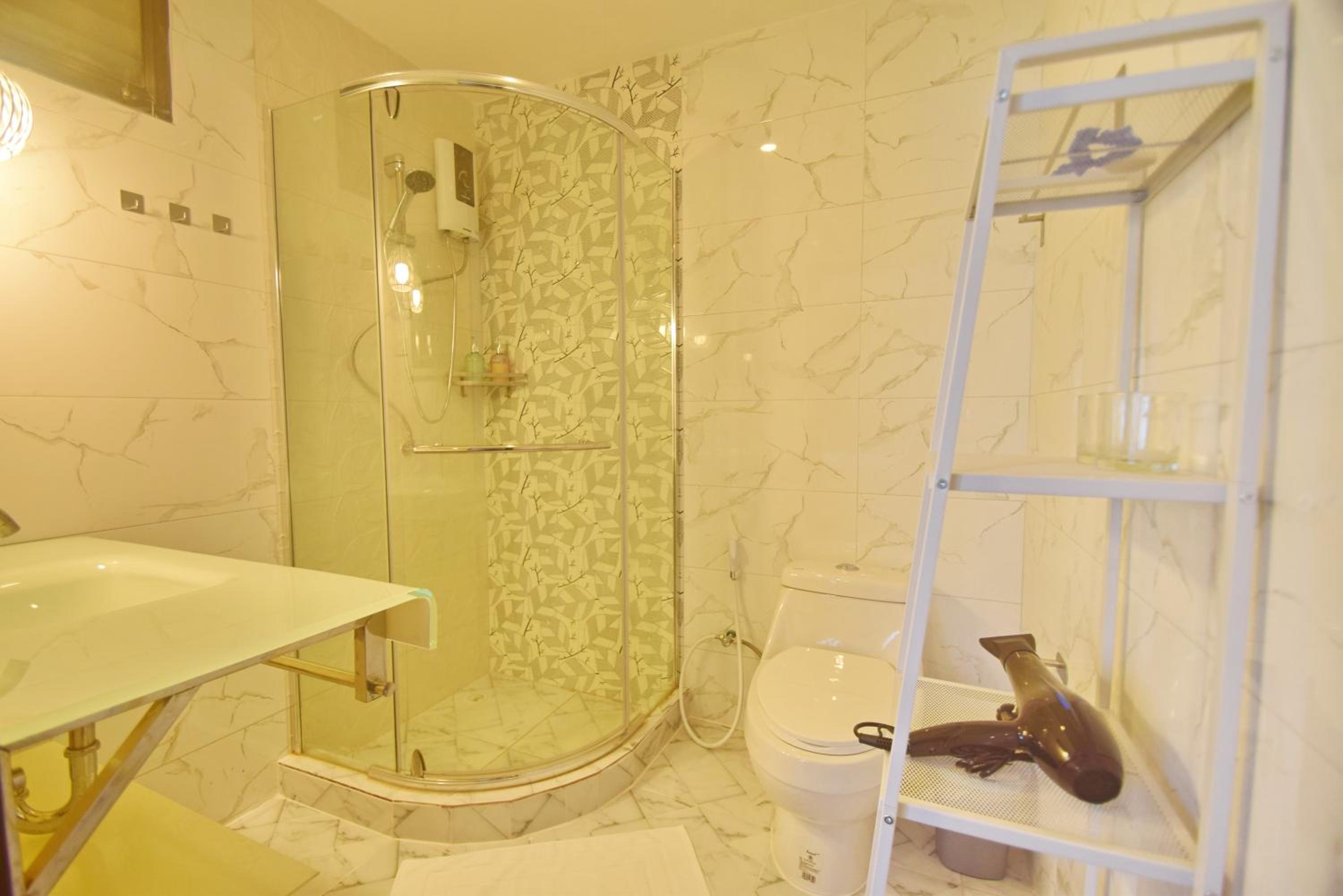 Three-Bedroom Townhouse - Photo 40