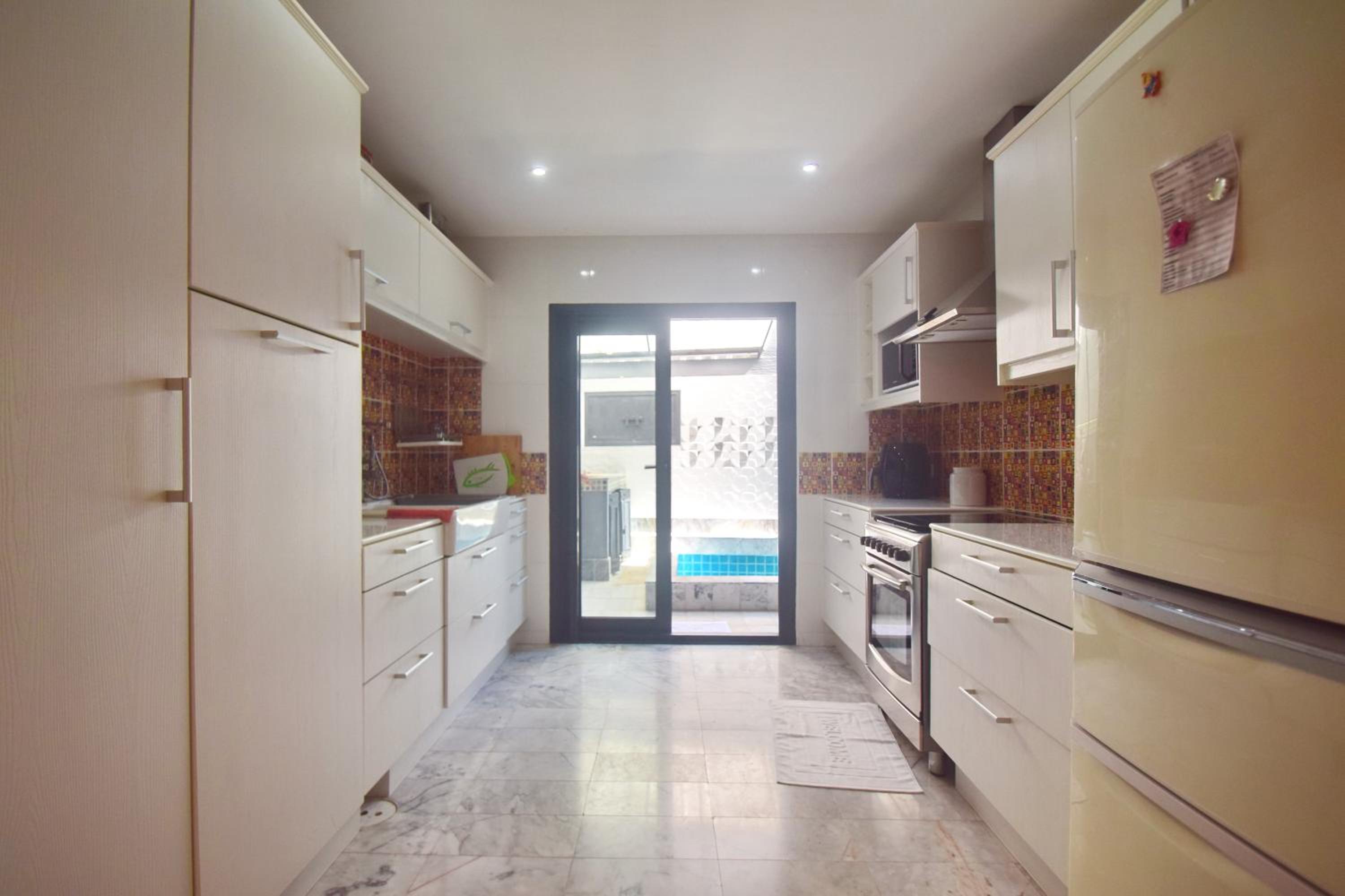Three-Bedroom Townhouse - Photo 32