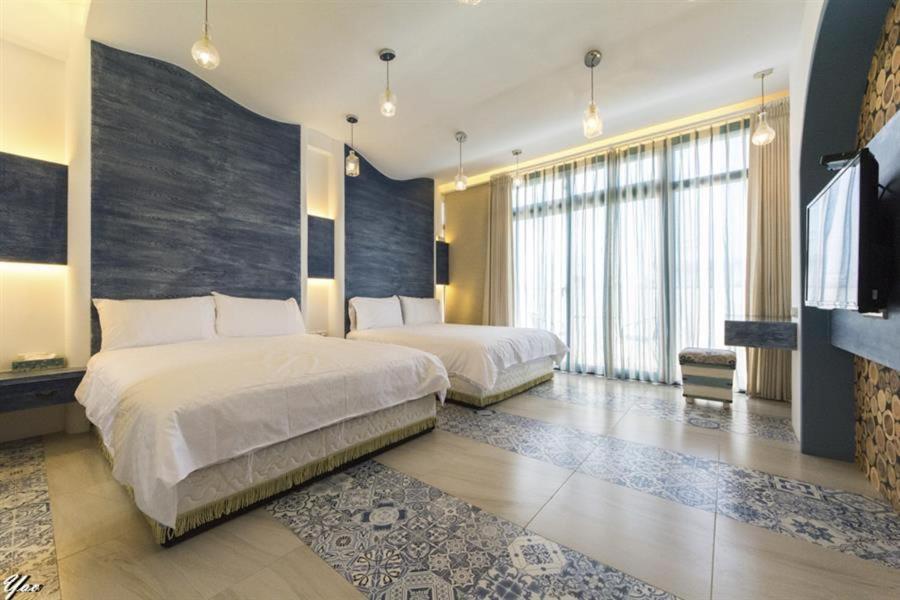 Quadruple Room with Balcony - Photo 6