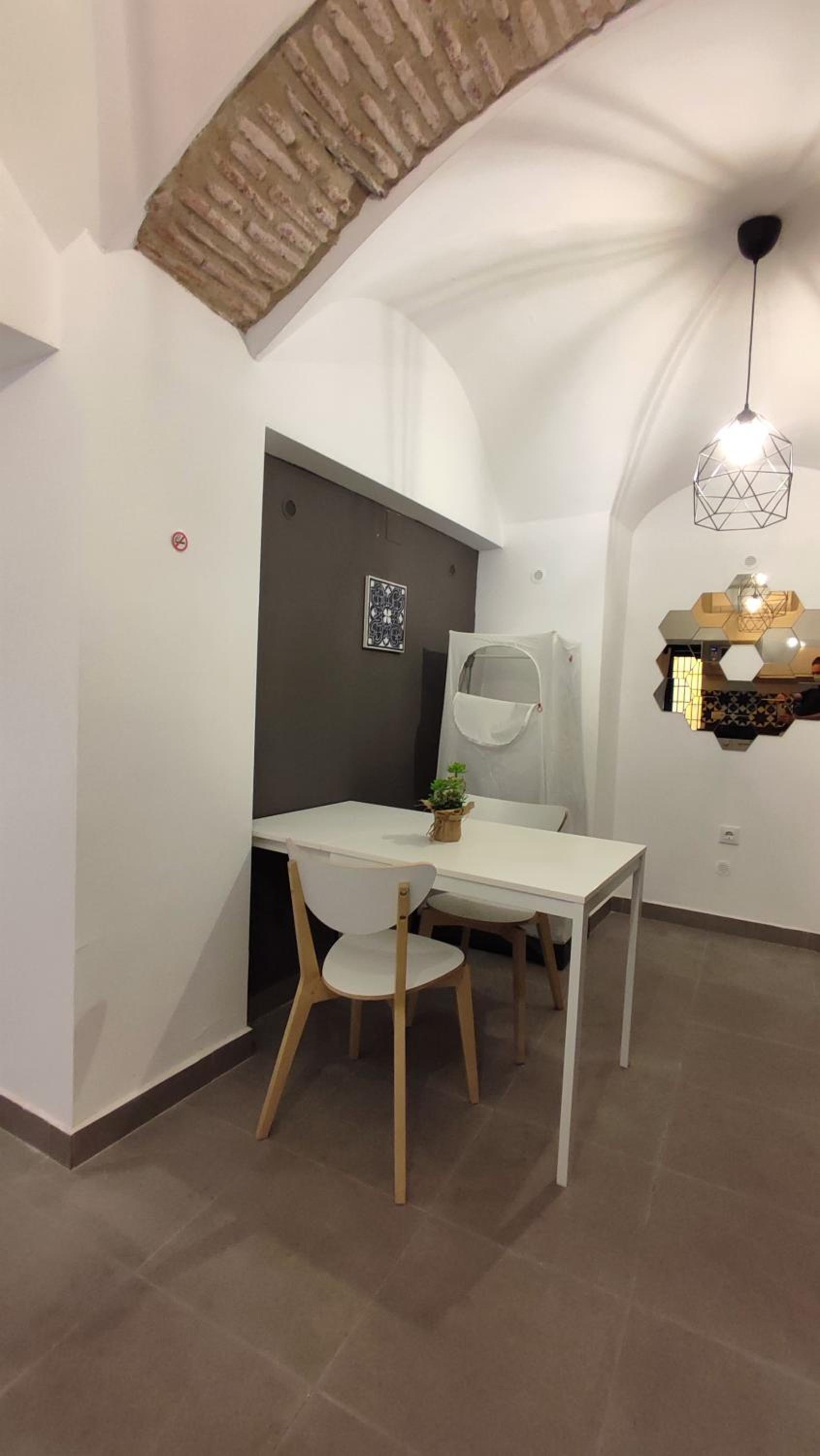 Studio Apartment with Patio - Photo 12