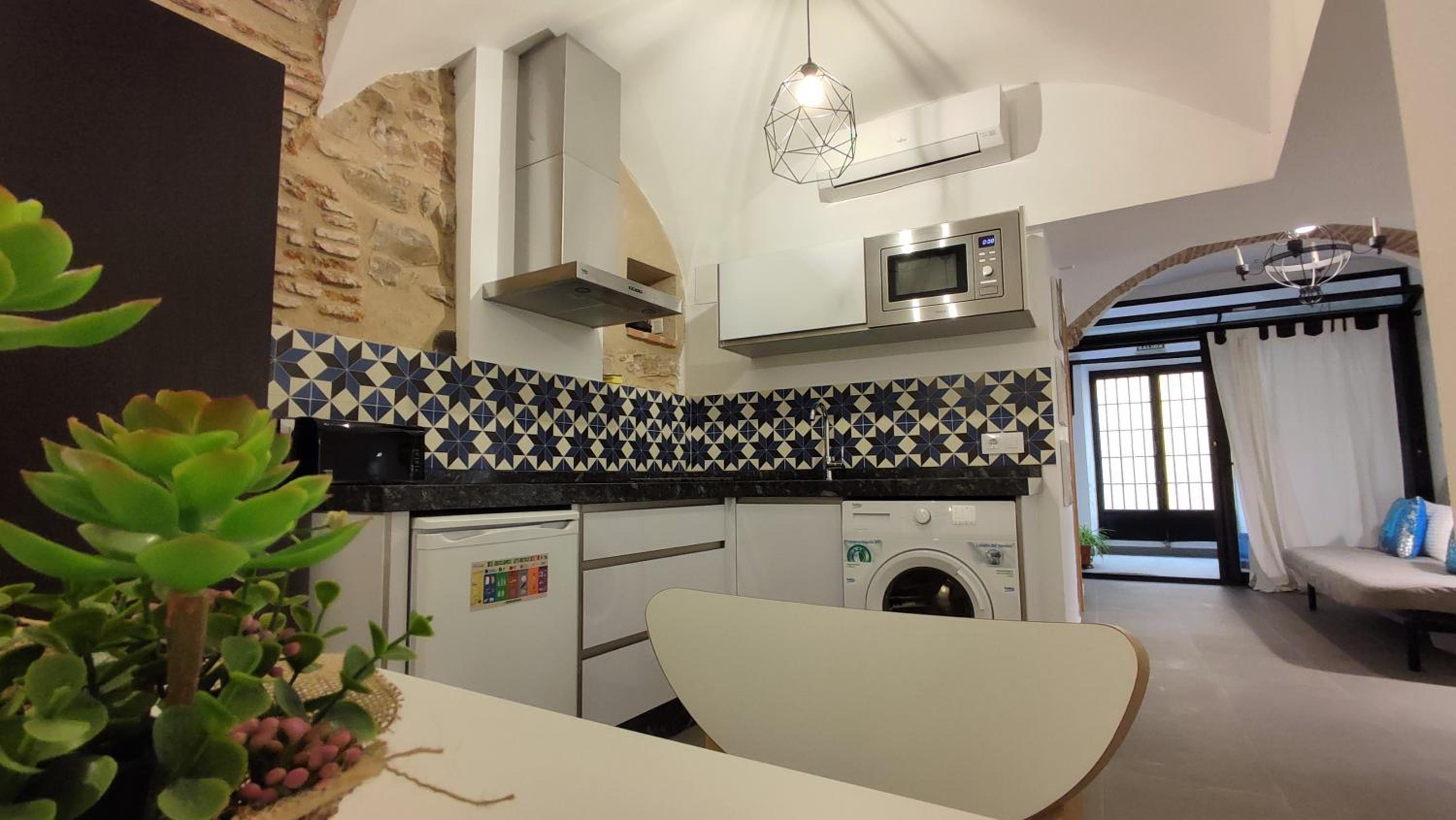 Studio Apartment with Patio - Photo 16