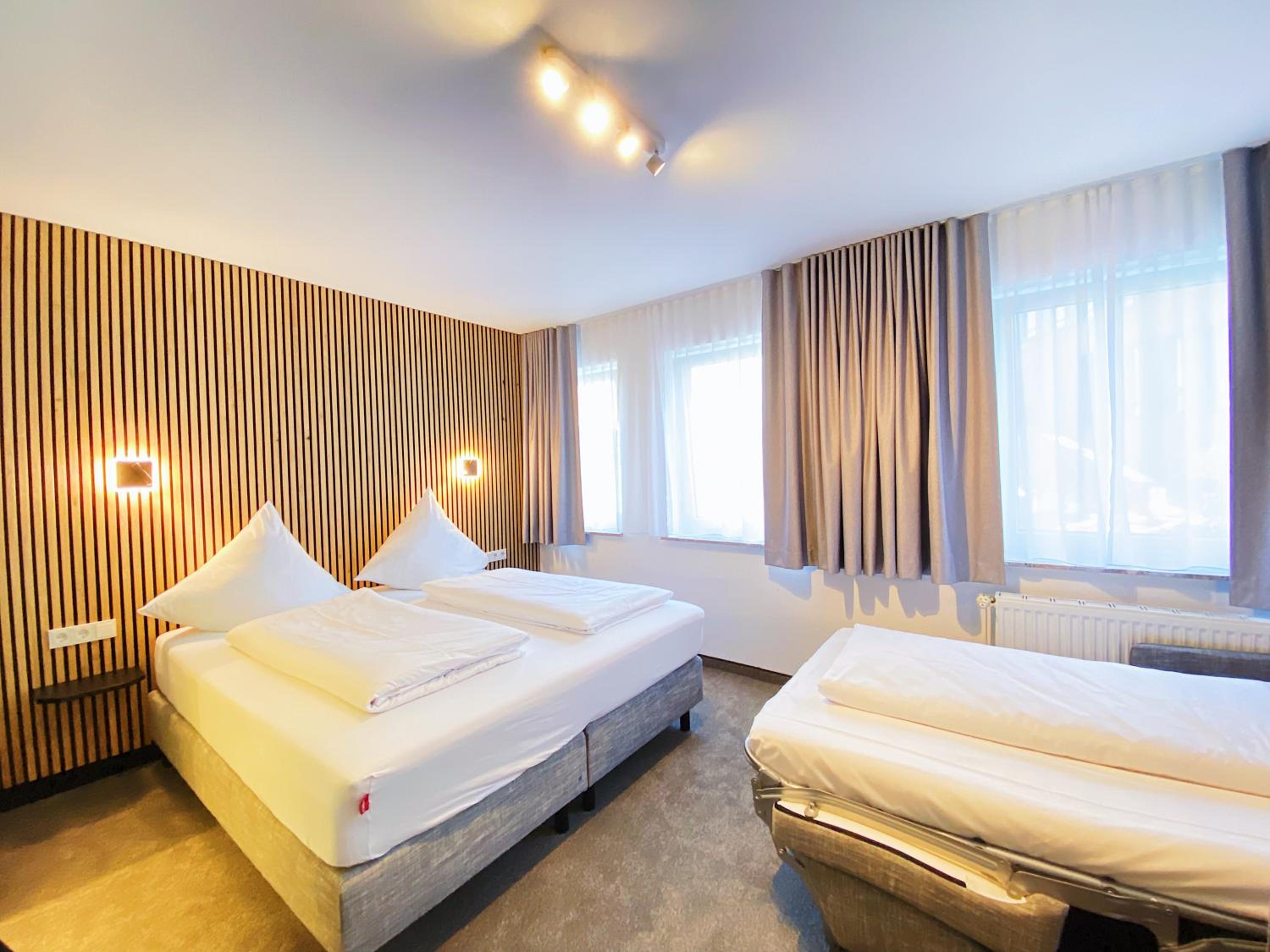 Dreibettzimmer
