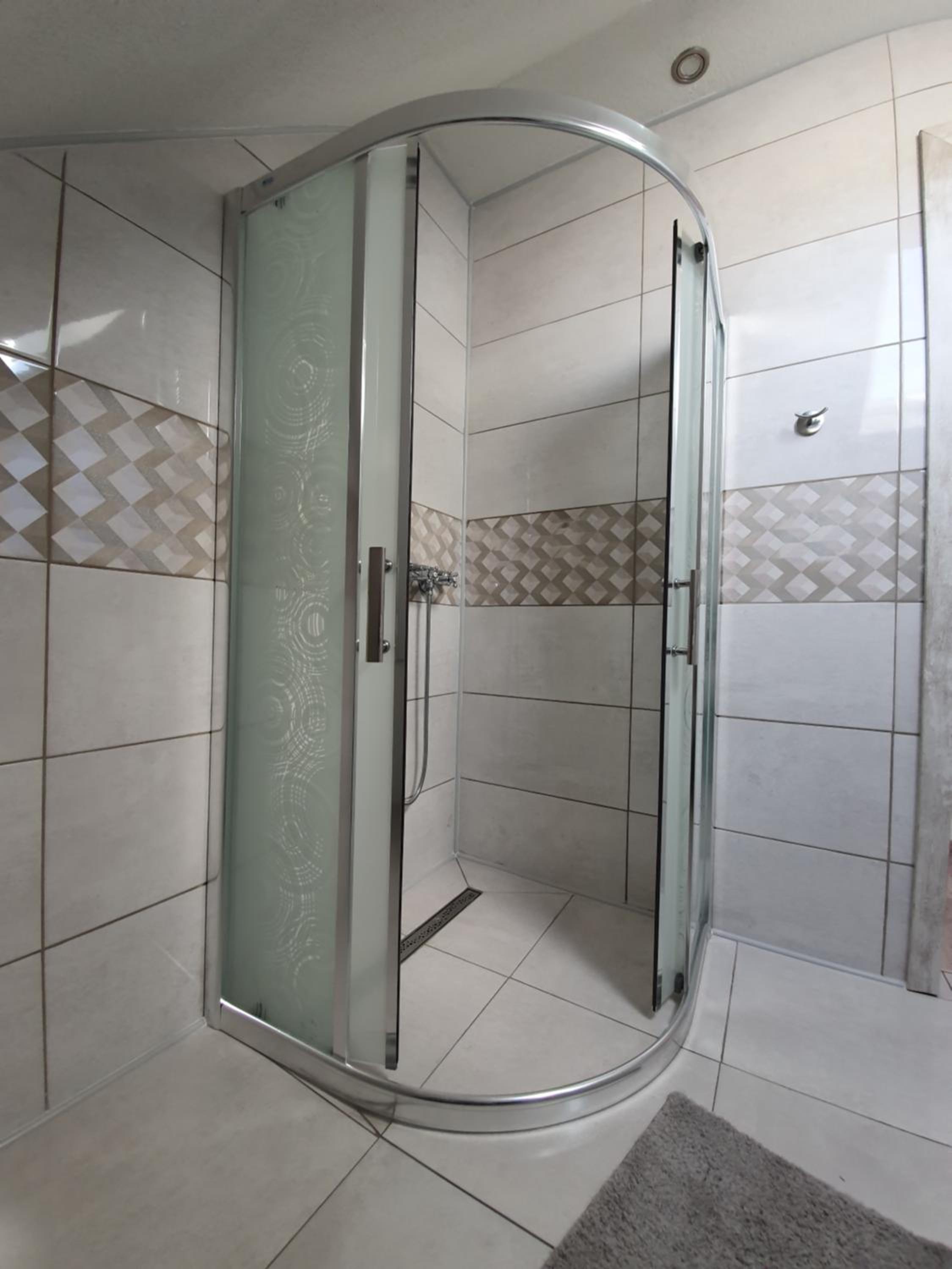 Three-Bedroom Apartment - Photo 12