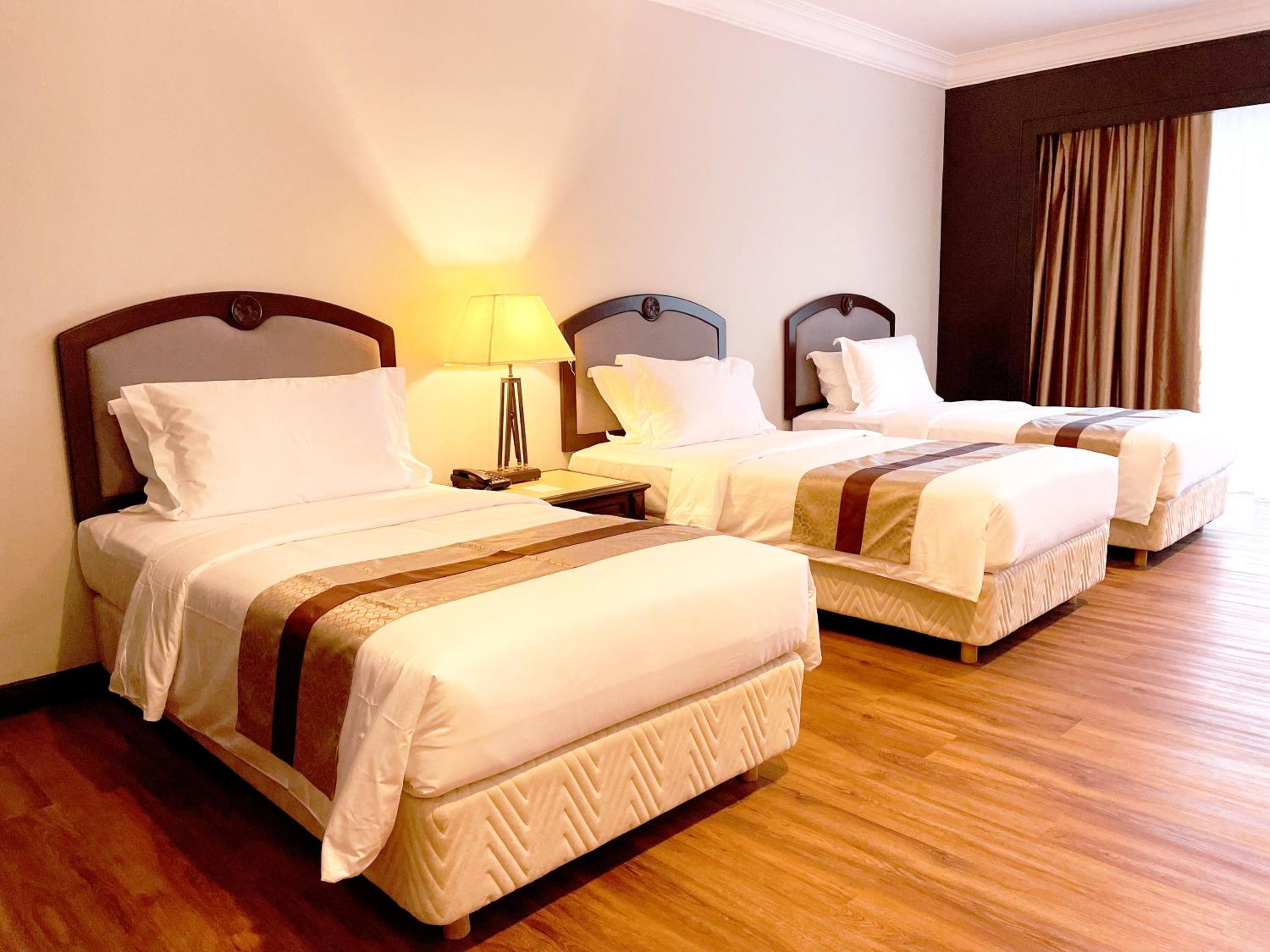 Deluxe Triple Room - Photo 1