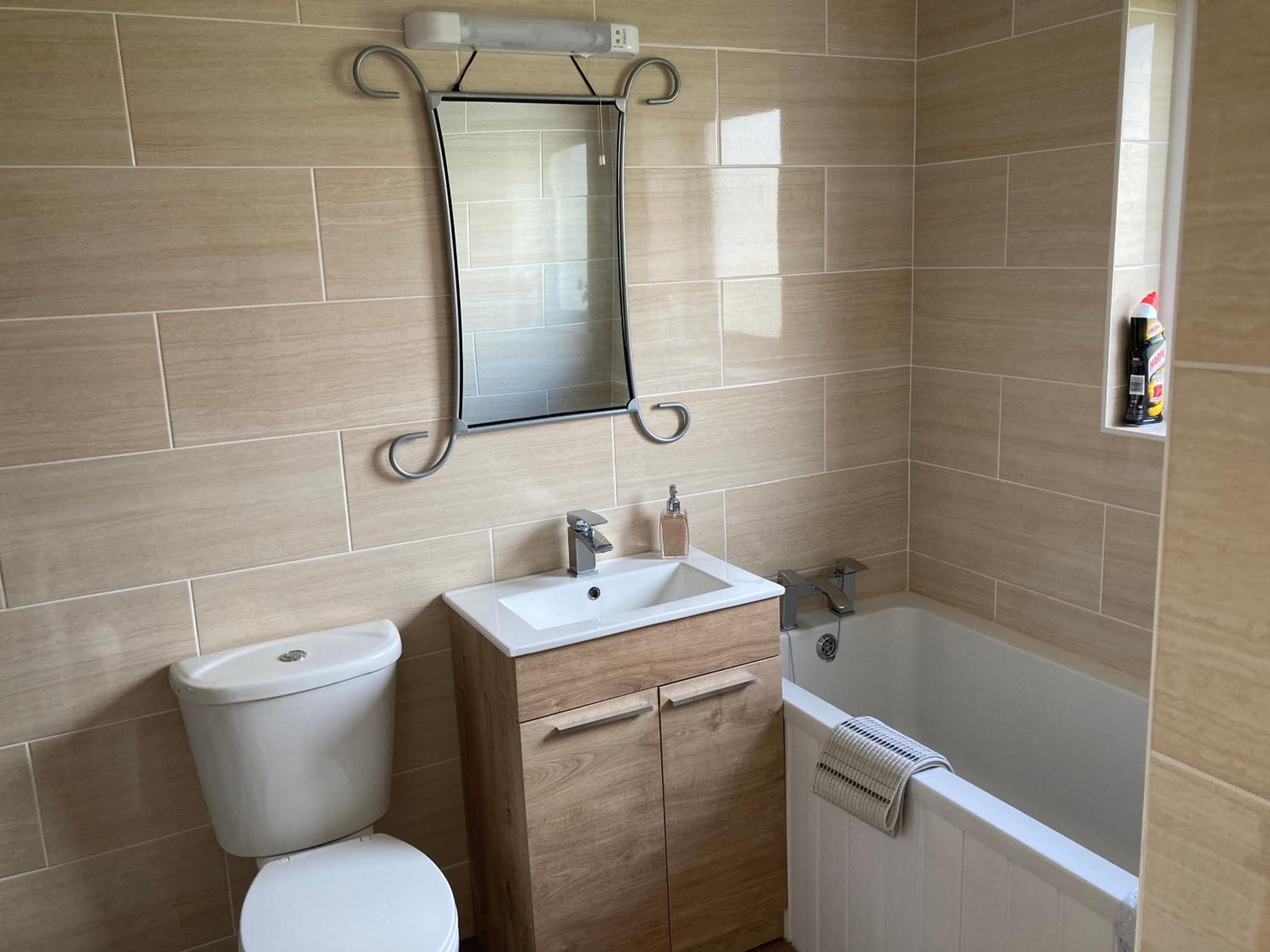 Three-Bedroom House - Photo 7