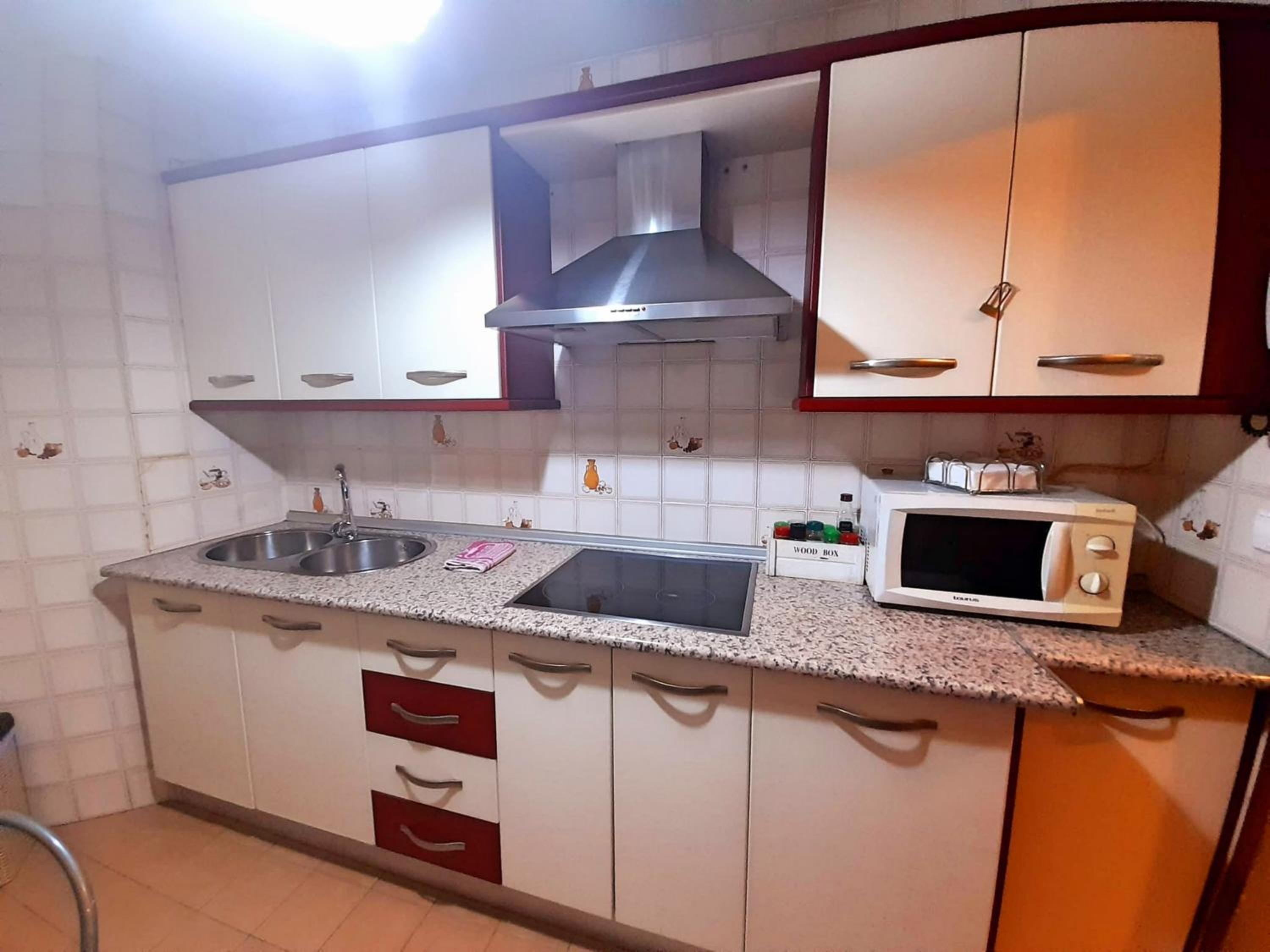 Three-Bedroom Apartment - Photo 25