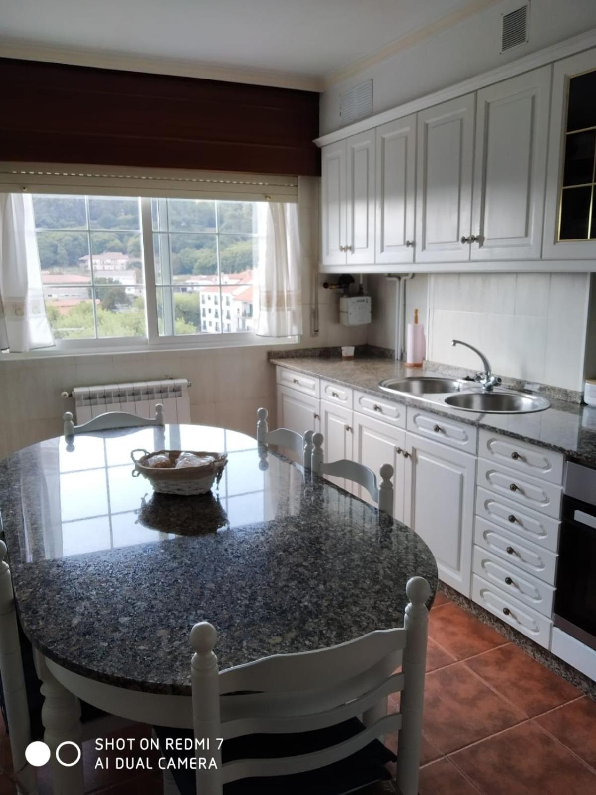 Three-Bedroom Apartment - Photo 12
