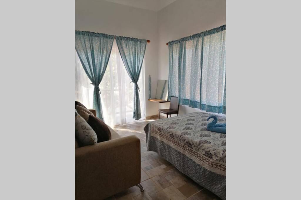 Three-Bedroom House - Photo 49