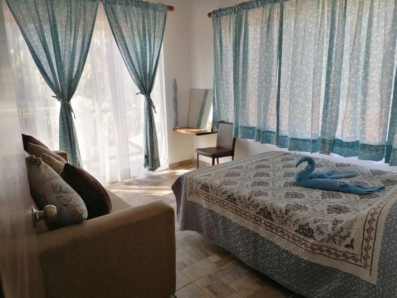Three-Bedroom House - Photo 22
