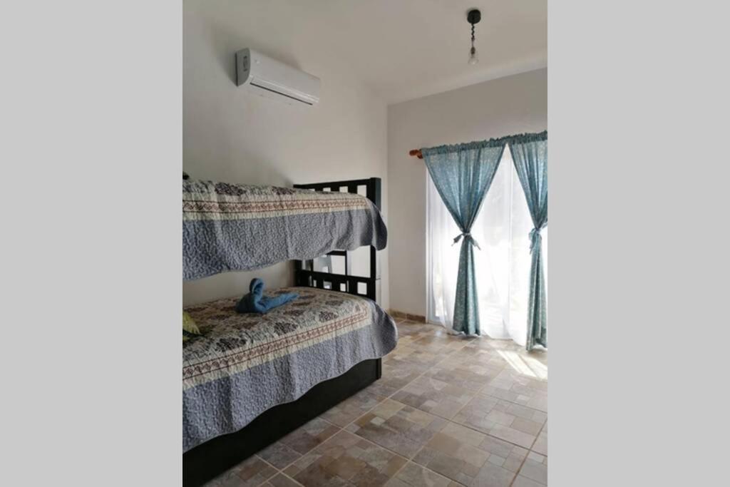 Three-Bedroom House - Photo 17