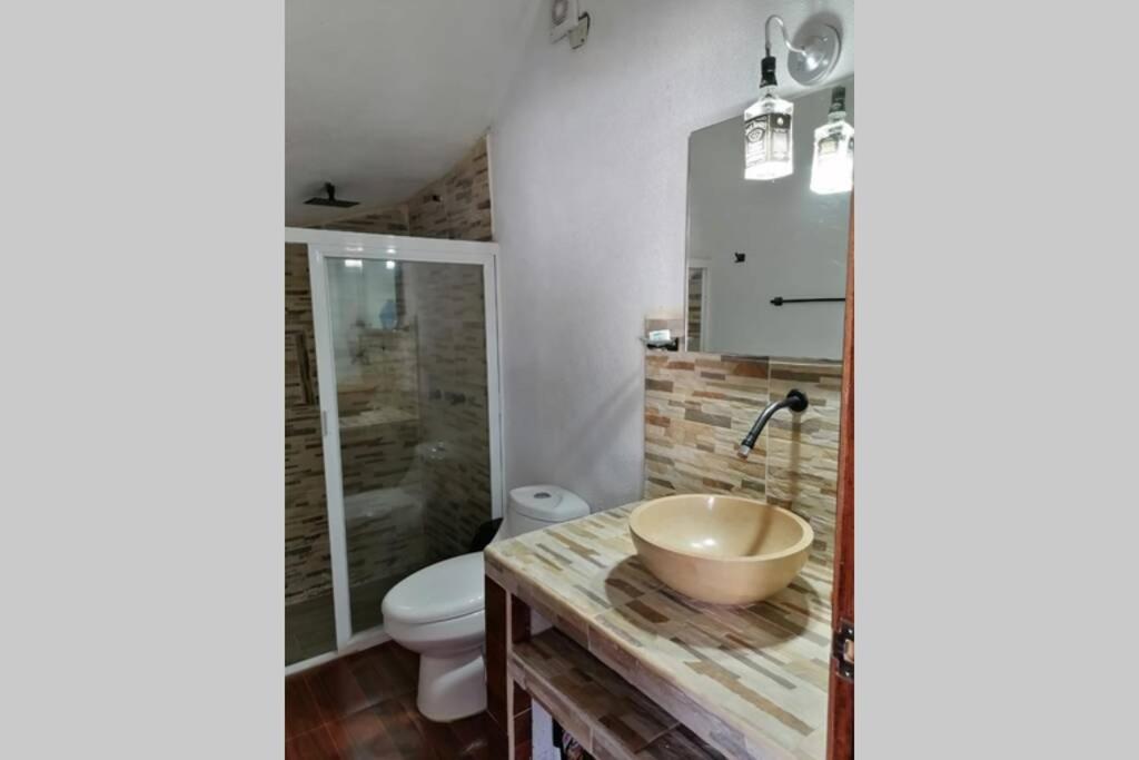 Three-Bedroom House - Photo 16