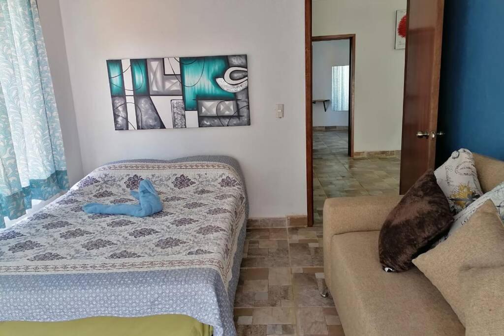 Three-Bedroom House - Photo 29