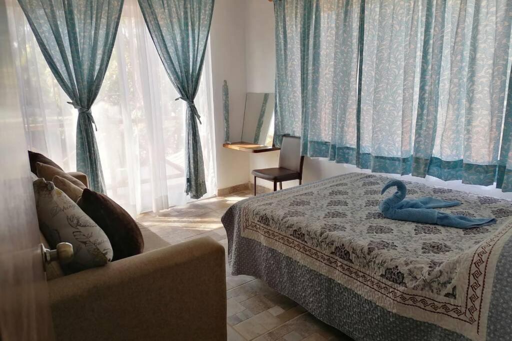 Three-Bedroom House - Photo 30