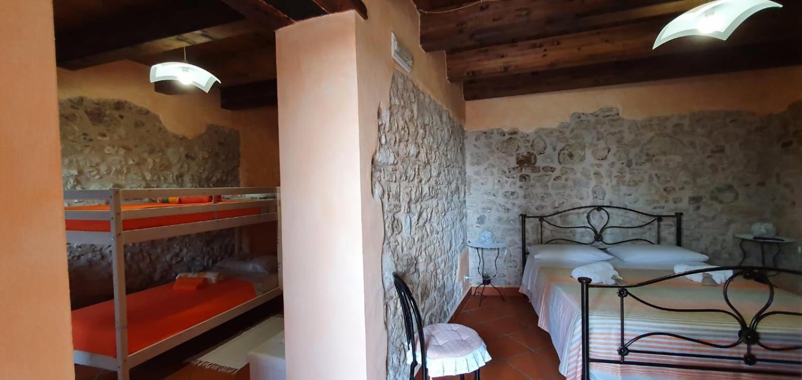 Quadruple Room with Private Bathroom - Photo 1