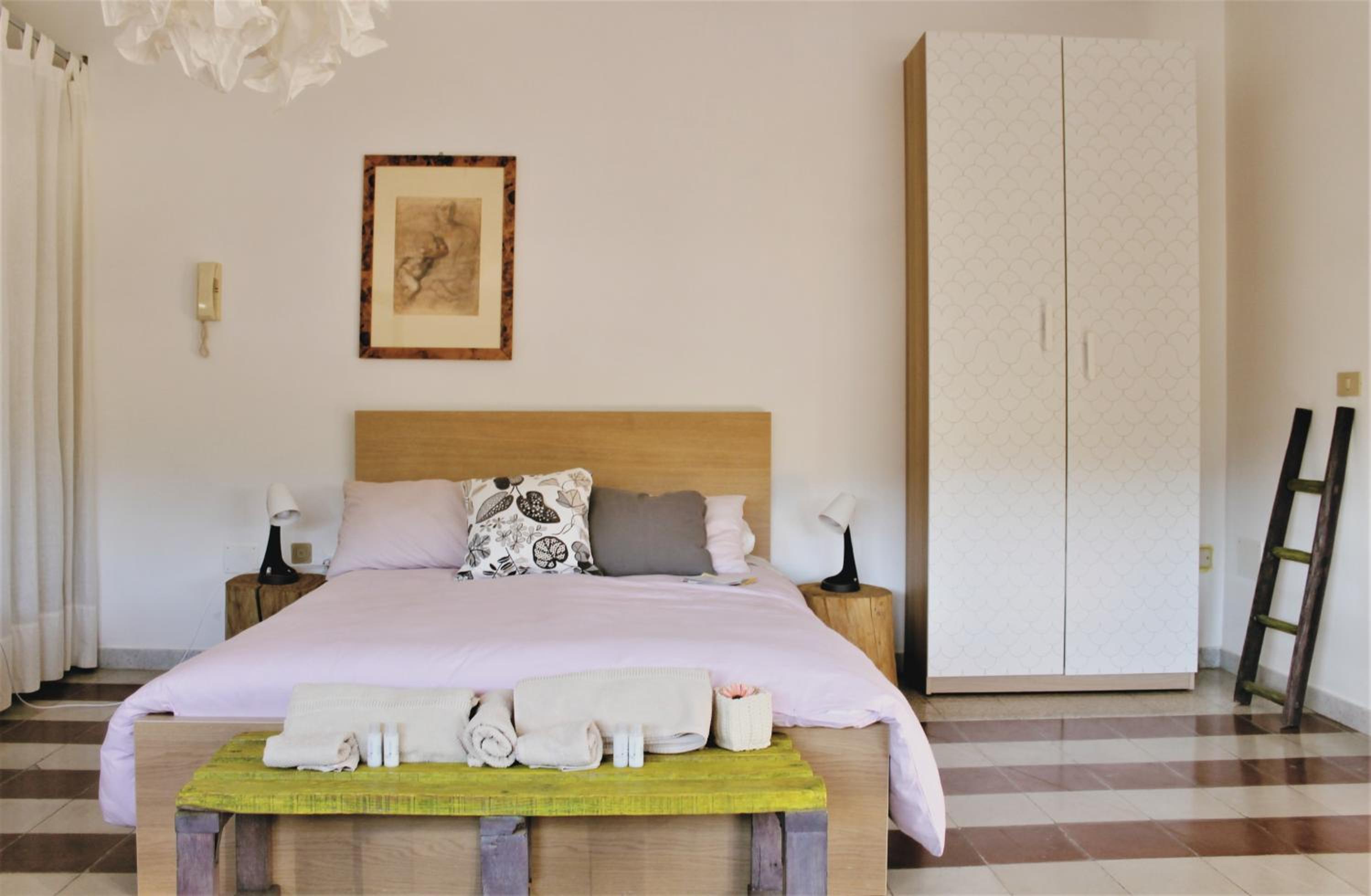Quadruple Room with Private Bathroom