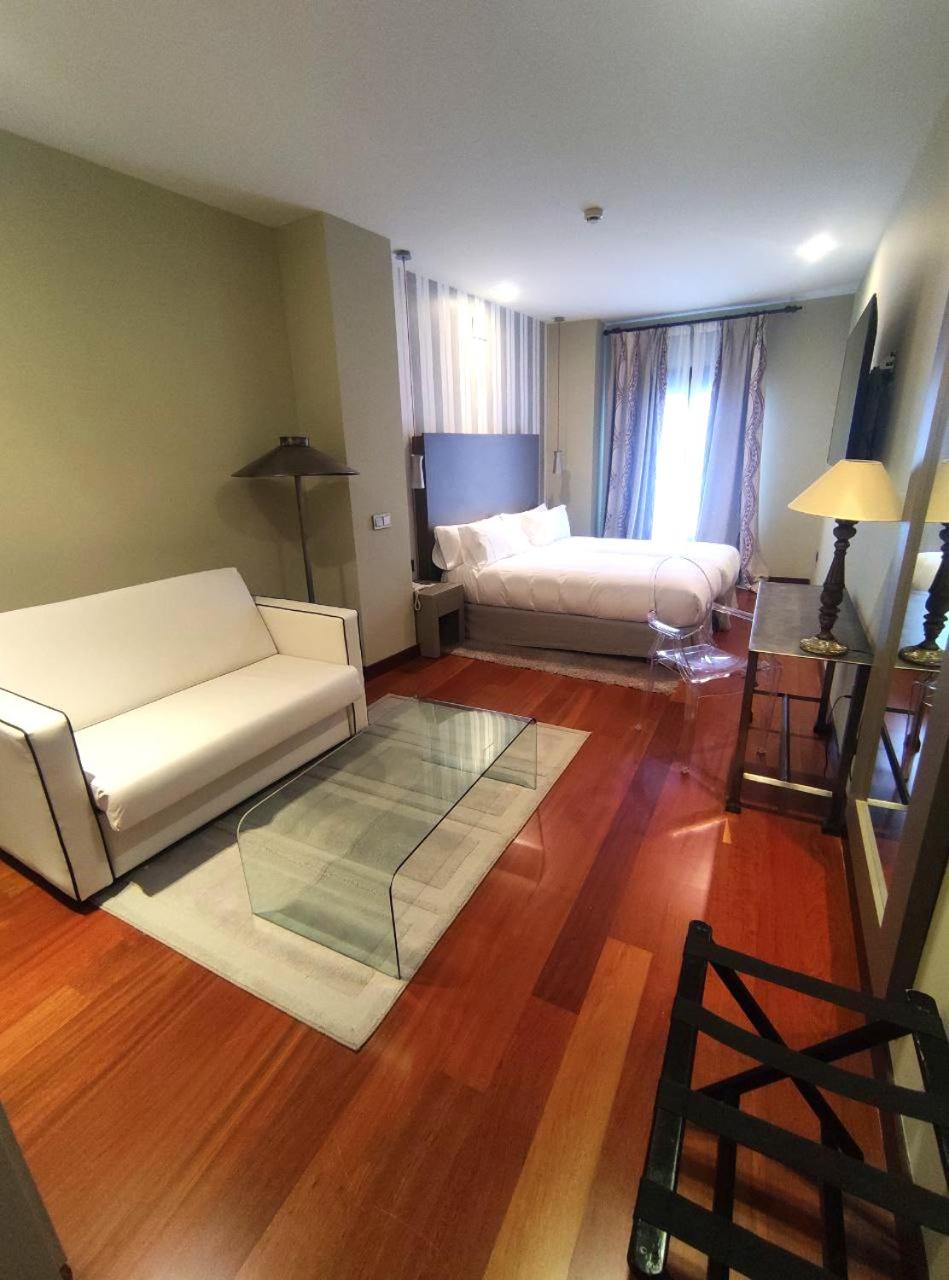 Habitación Doble Superior con cama extra (2 adultos + 1 niño)