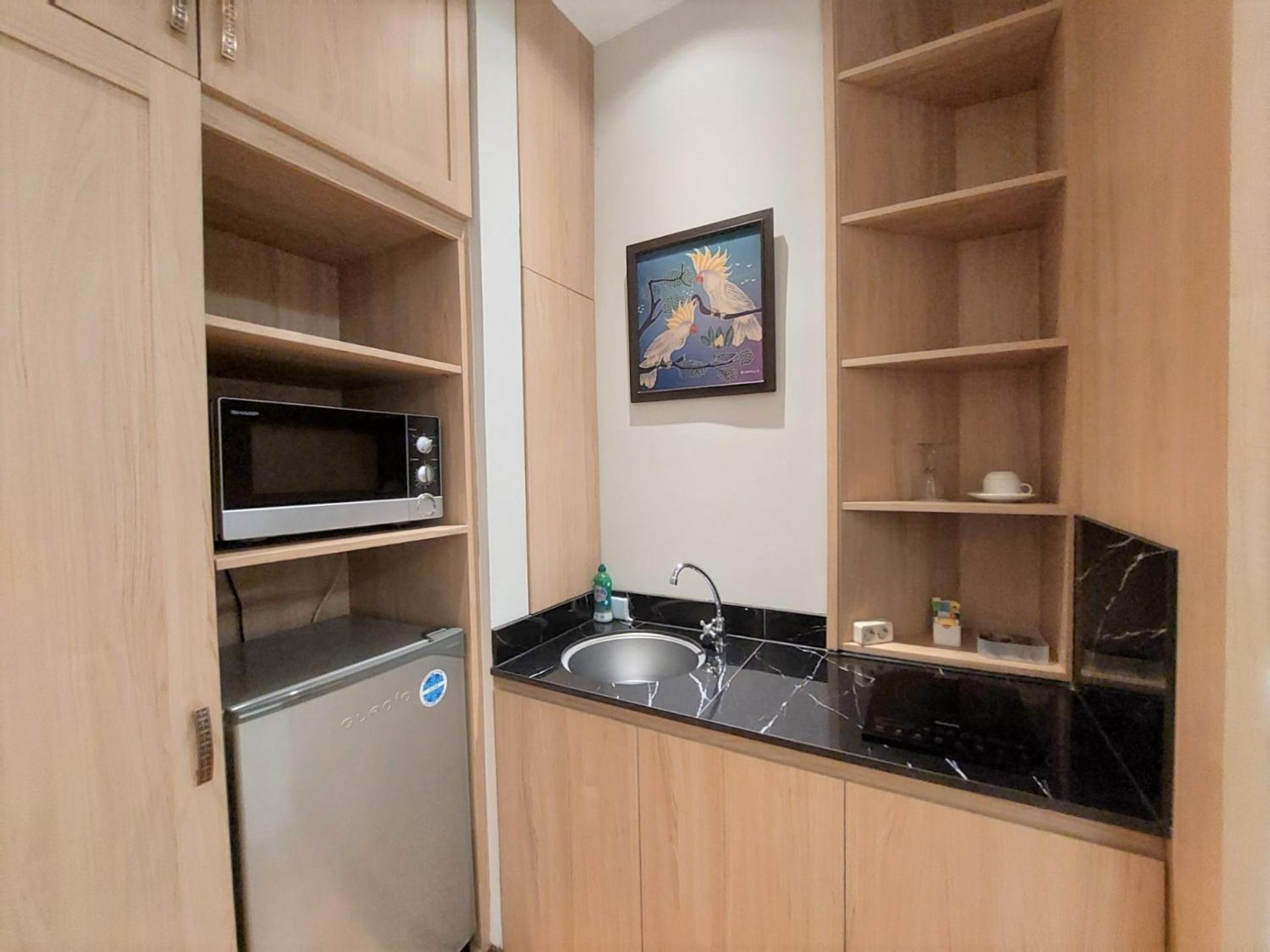 Deluxe Room - Photo 5