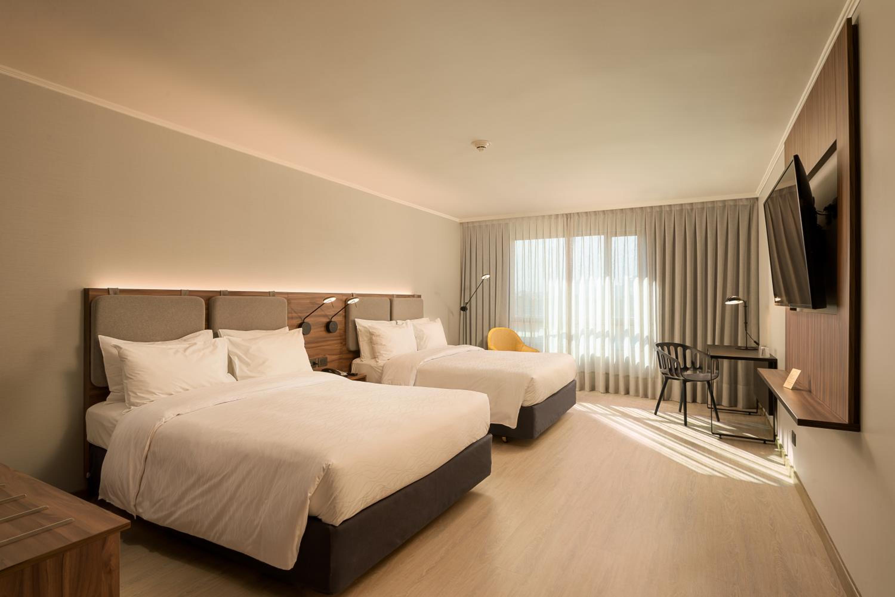 Standard Queen Room with Two Queen Beds - Photo 1