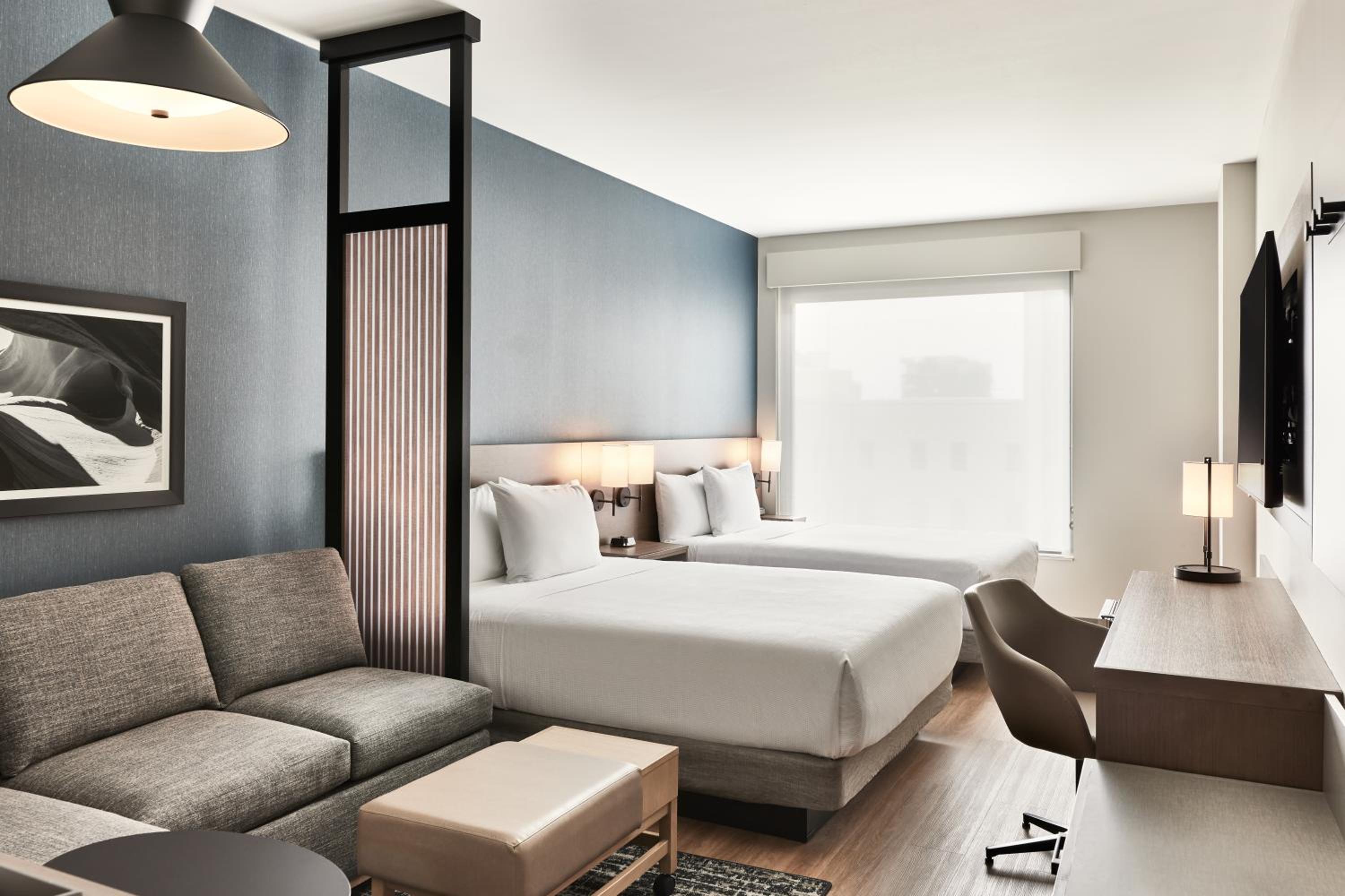 Queen Room with Two Queen Beds and Sofa Bed - Photo 3