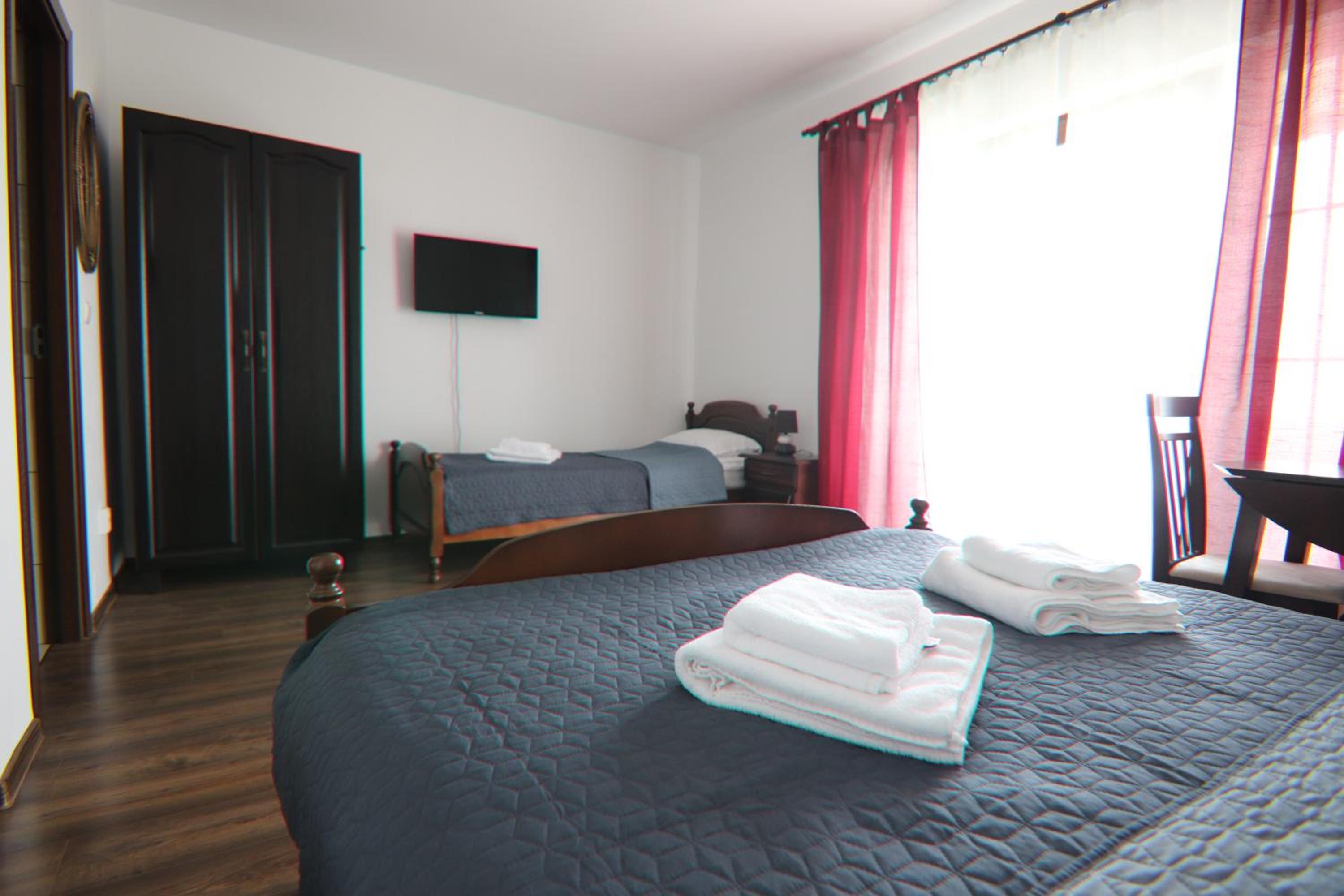 Triple Room with Balcony - Photo 14