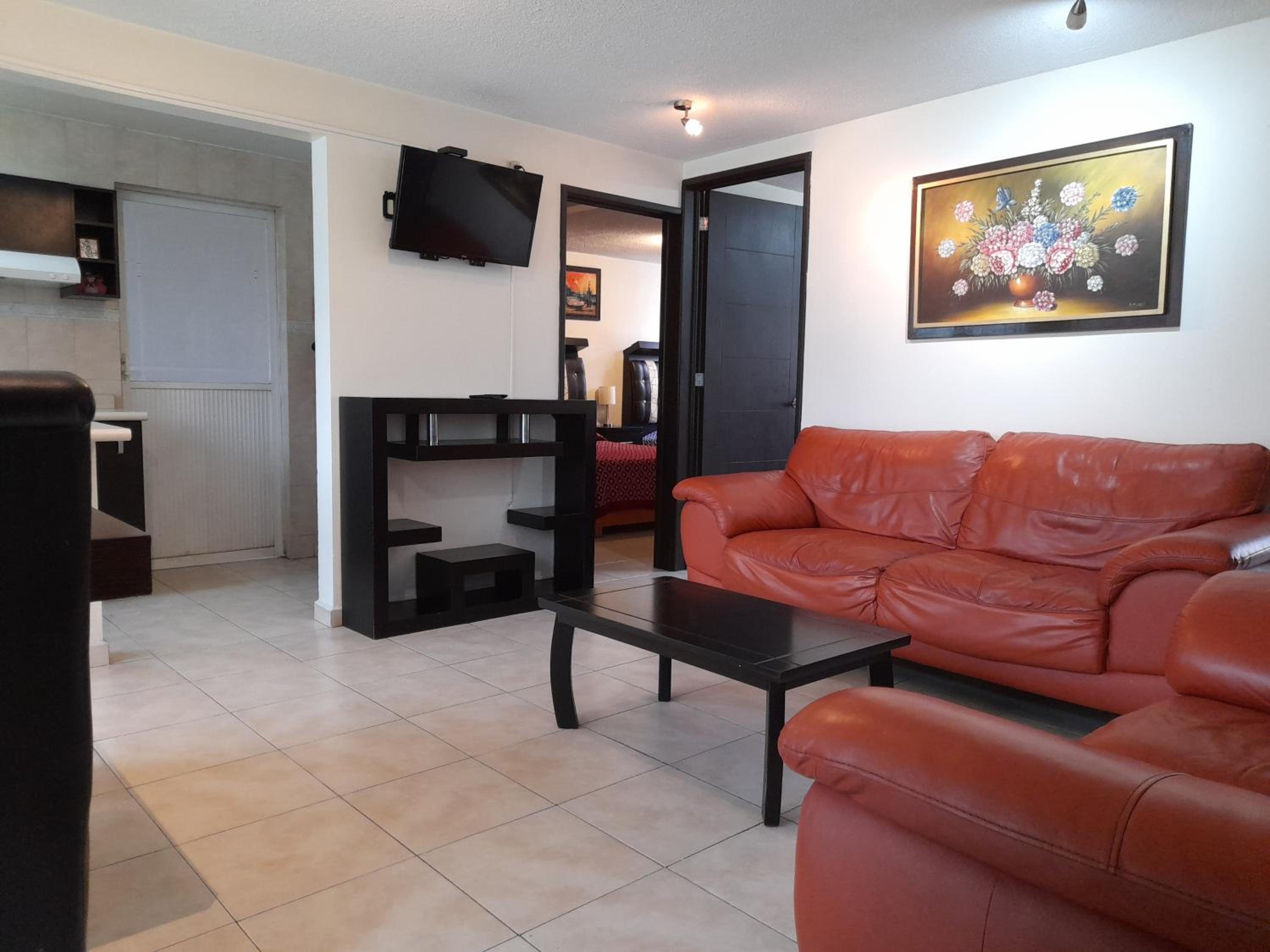Three-Bedroom Apartment photo 1