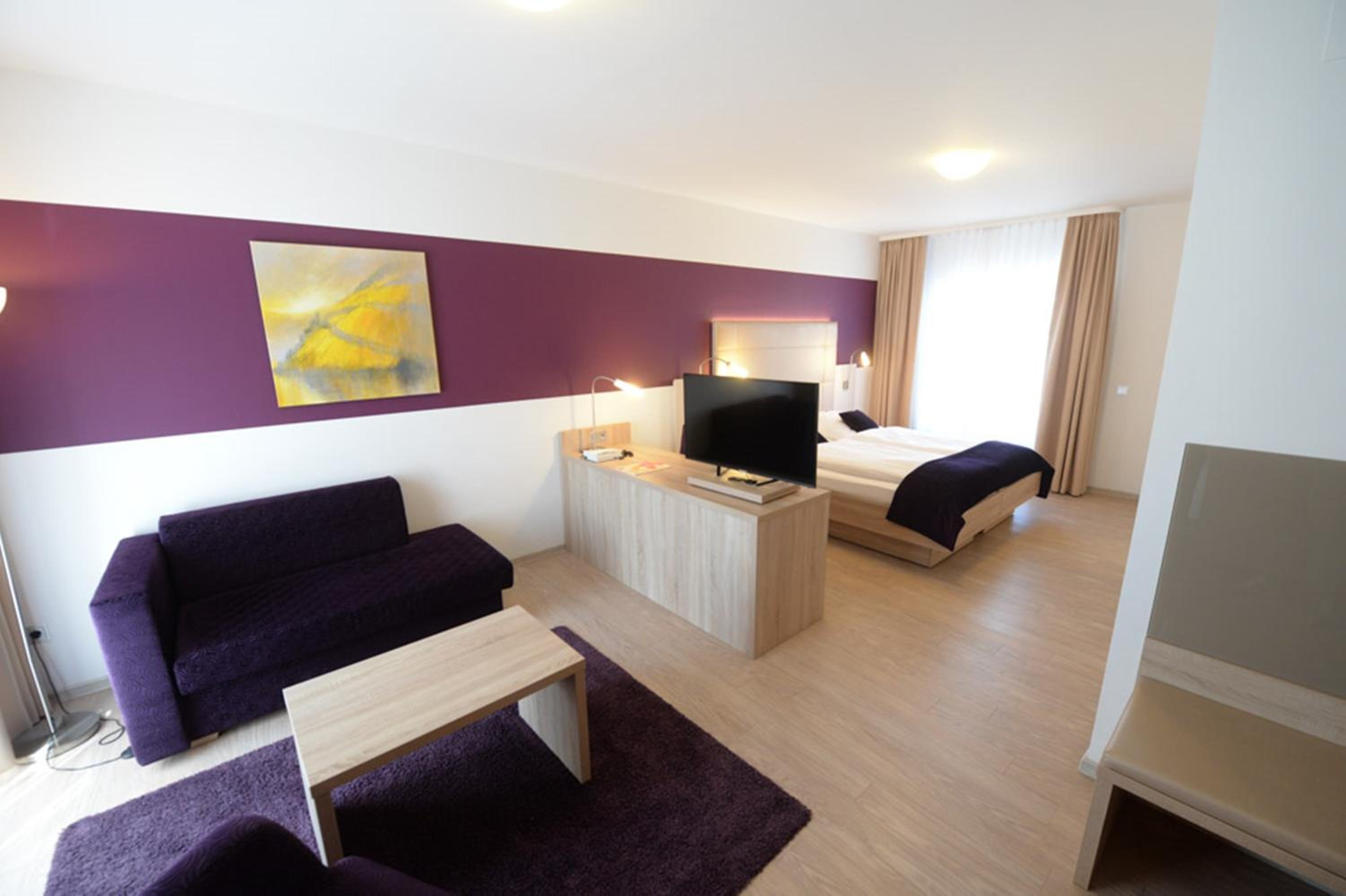 Deluxe Junior Suite - Photo 11