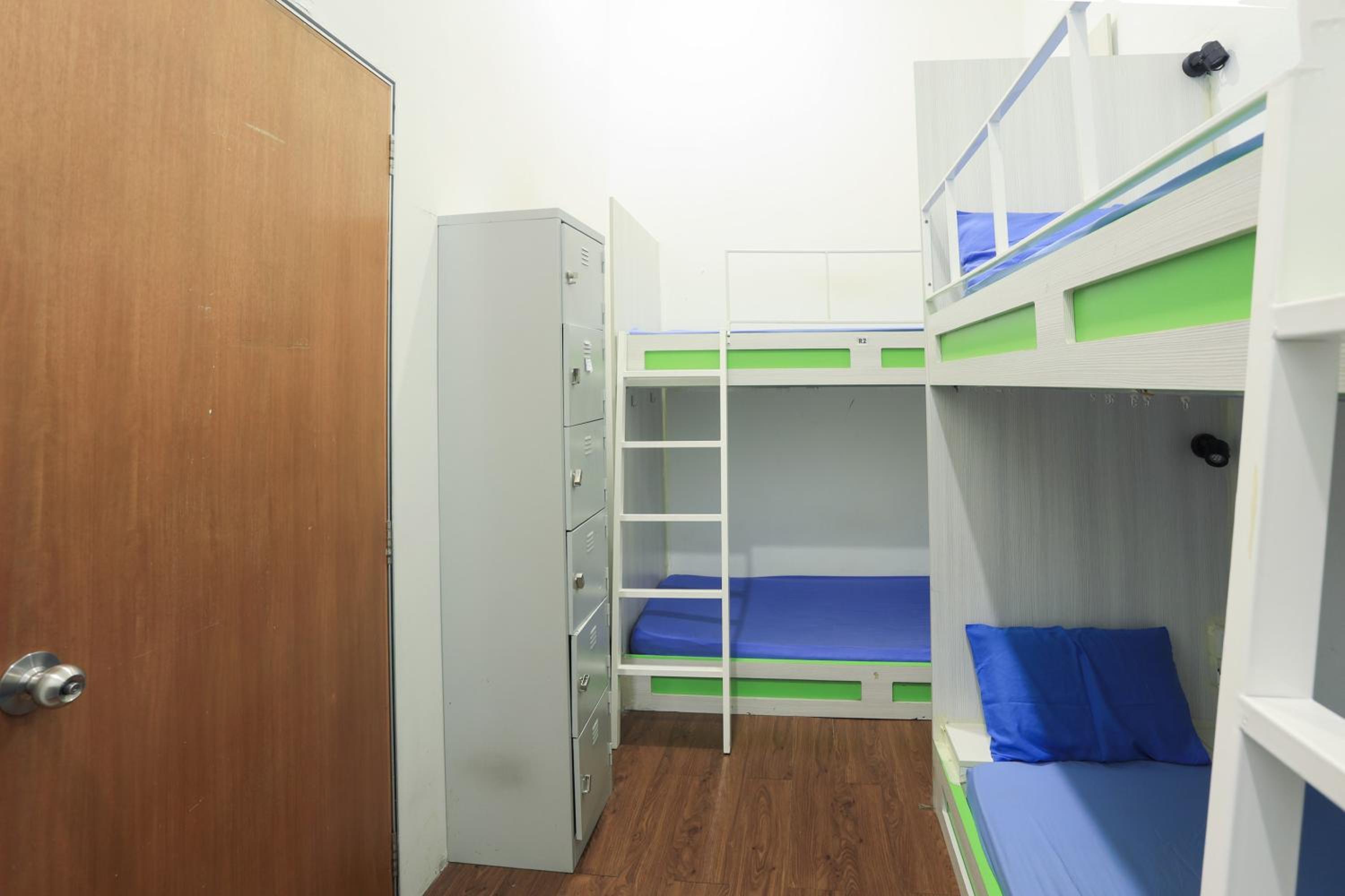 Single Bed In Mixed Dormitory Room