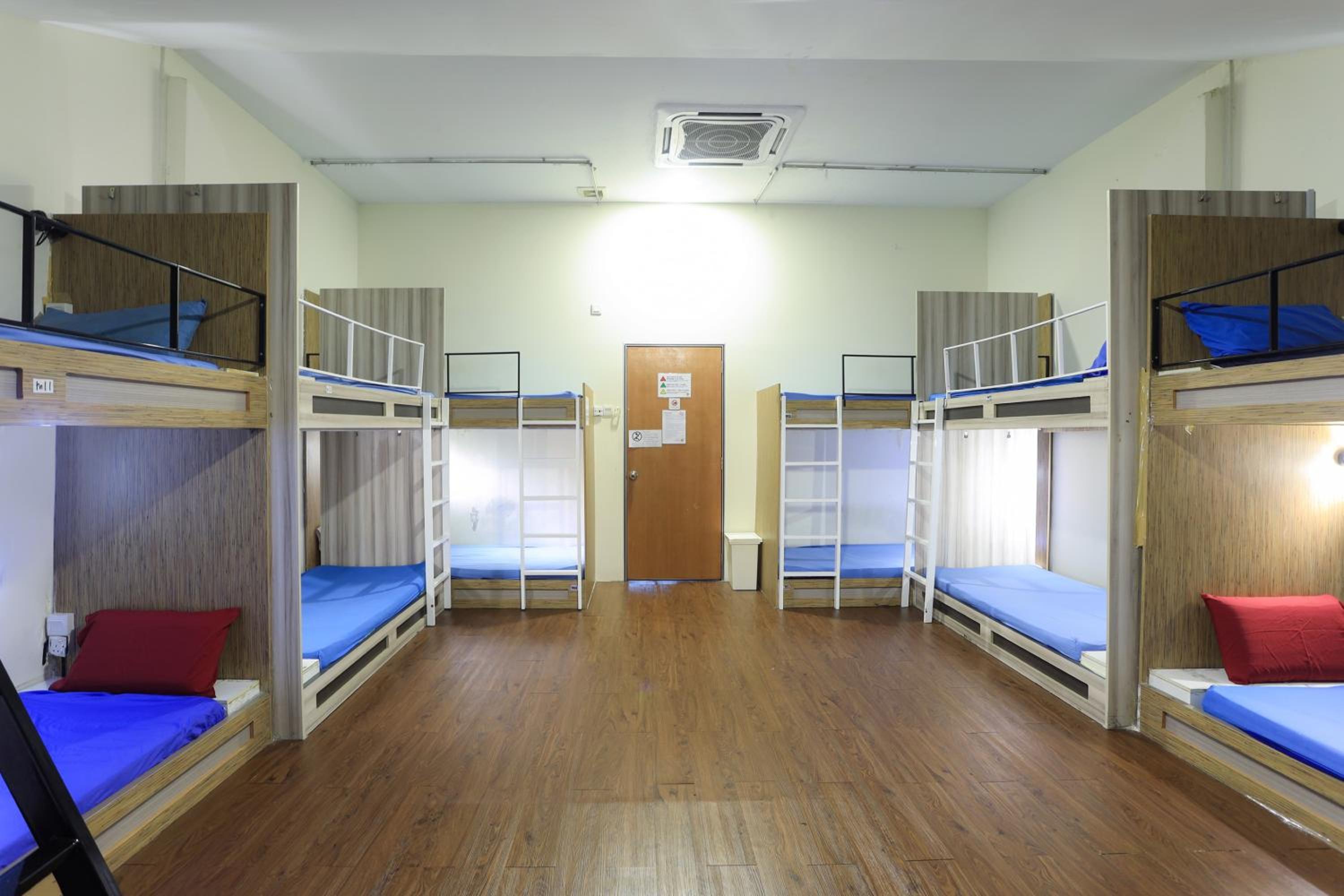 Bed In Male Dormitory Room