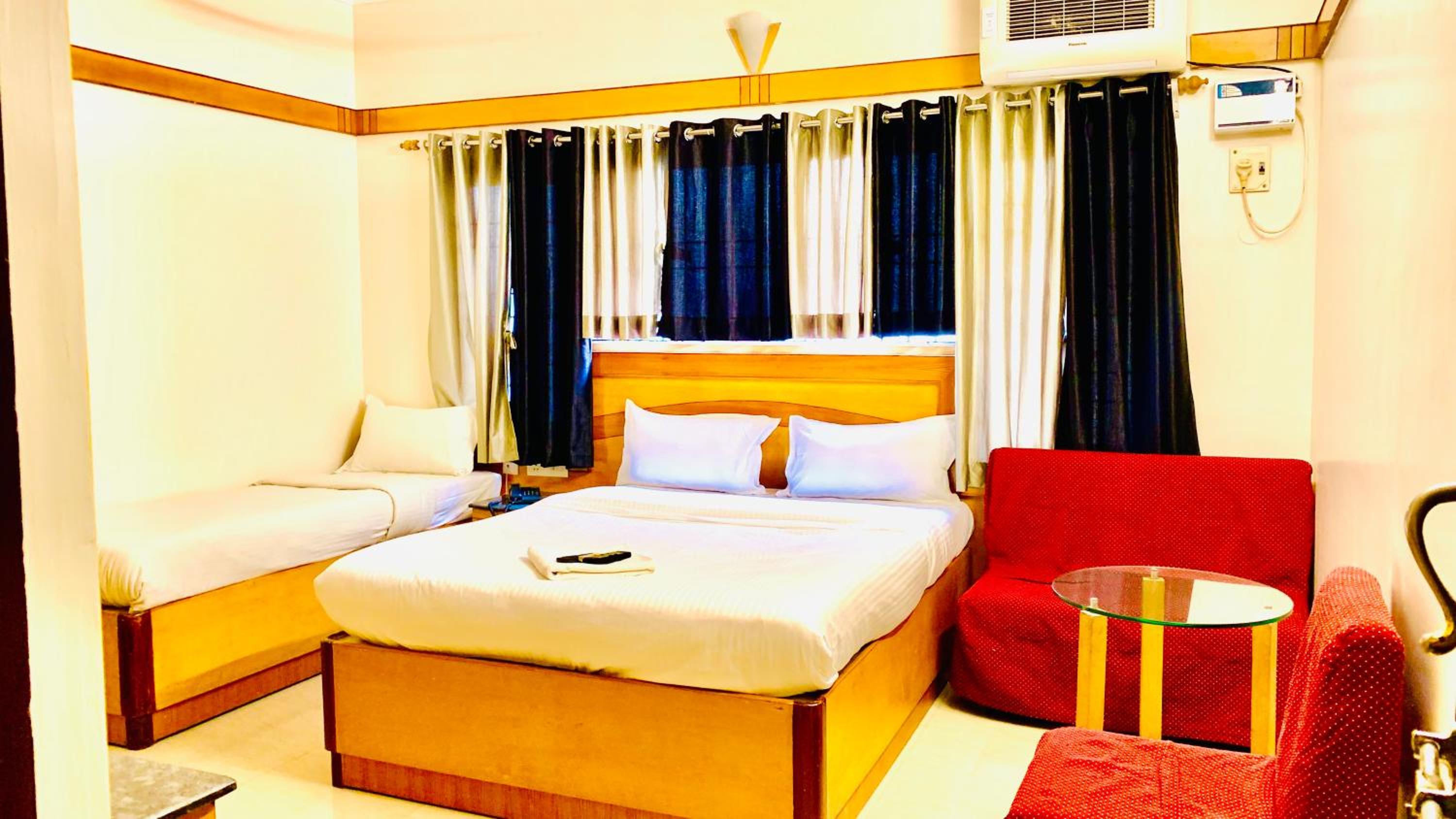 Deluxe Triple Room - Photo 8