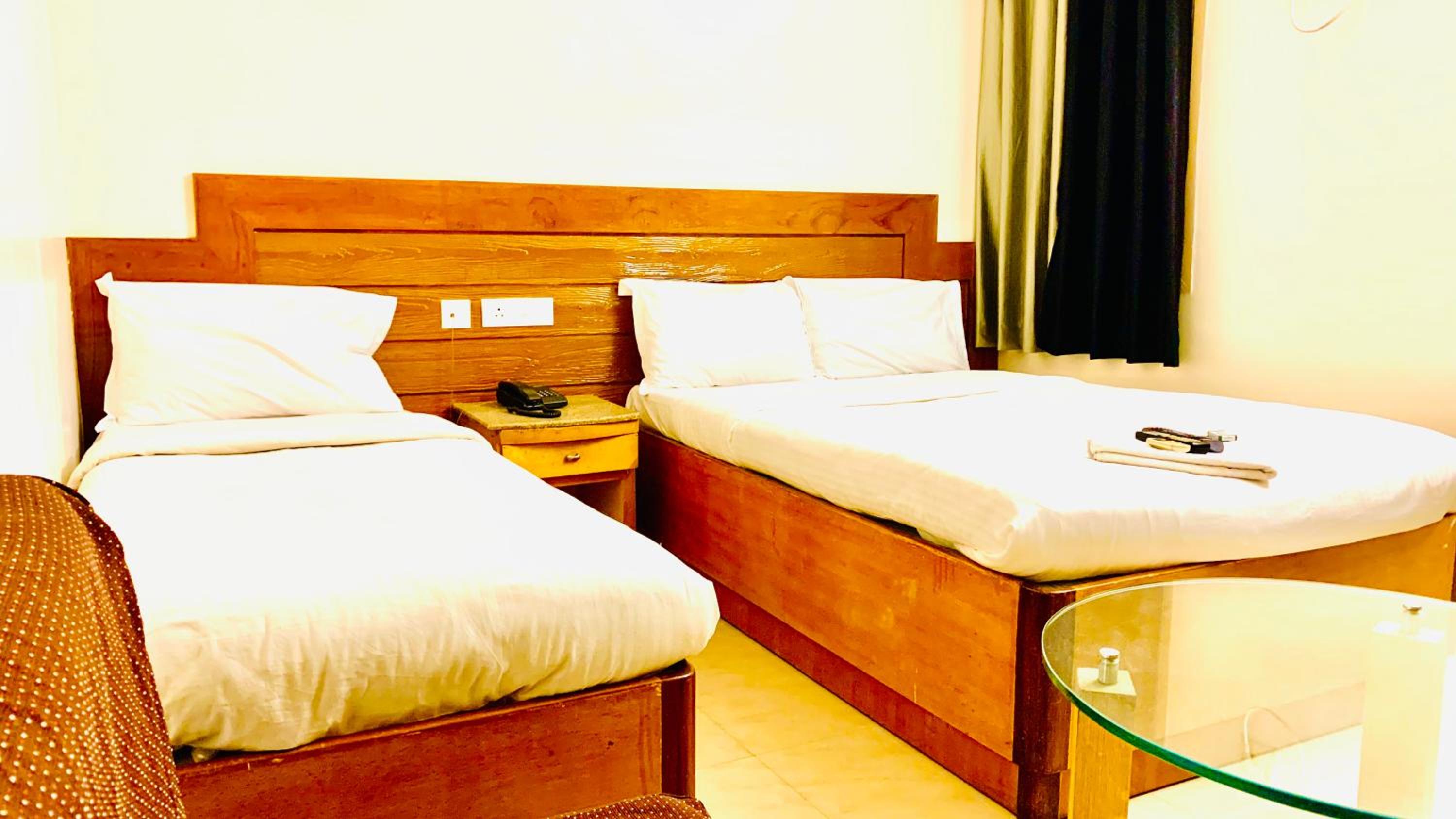 Deluxe Triple Room - Photo 10