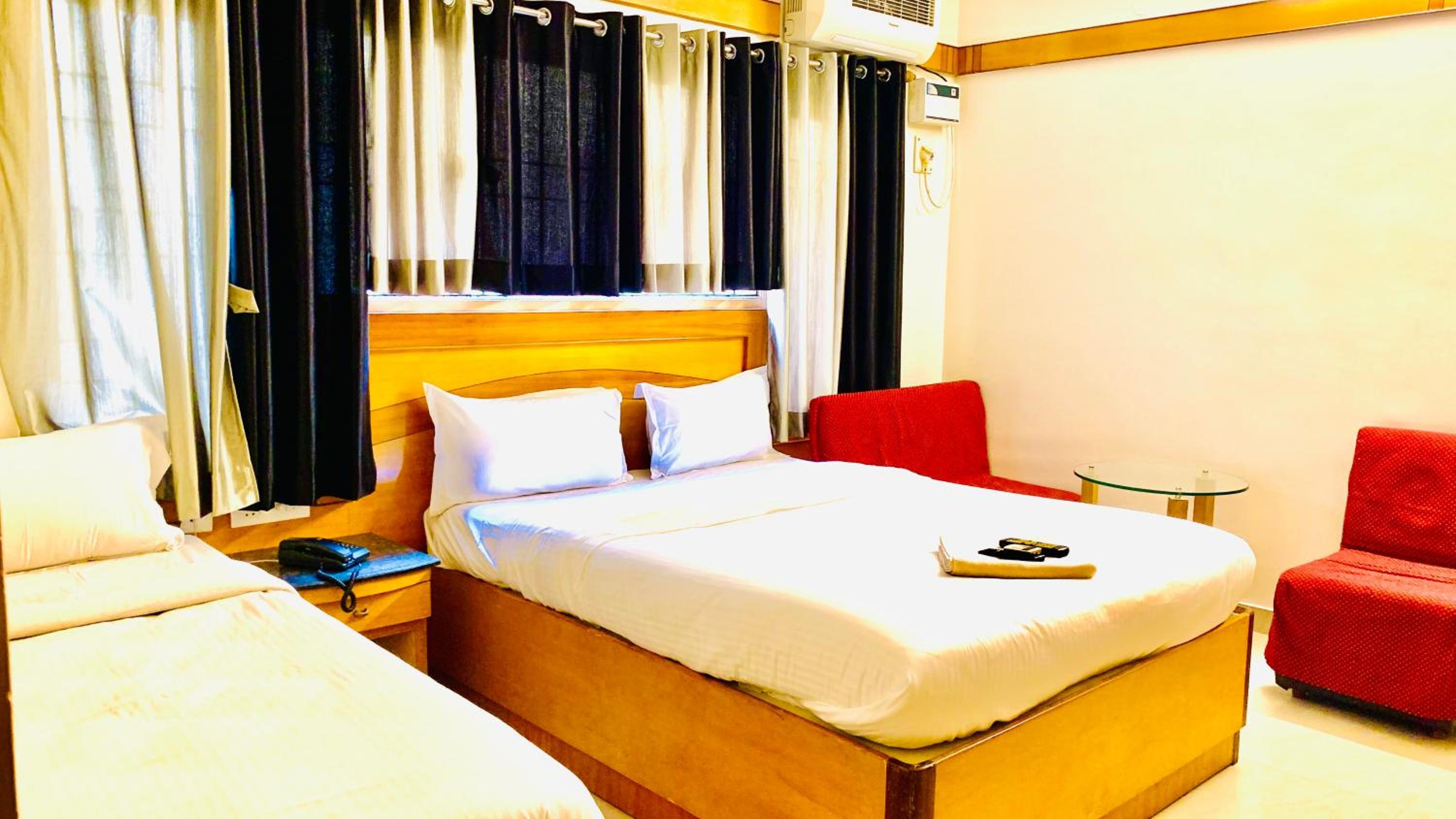 Deluxe Triple Room - Photo 9