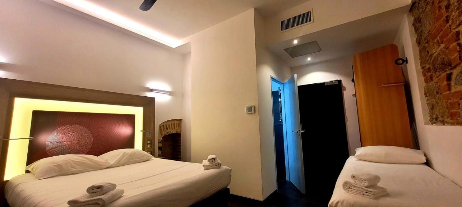 Triple Room (1 Double Bed + 1 Single Bed)