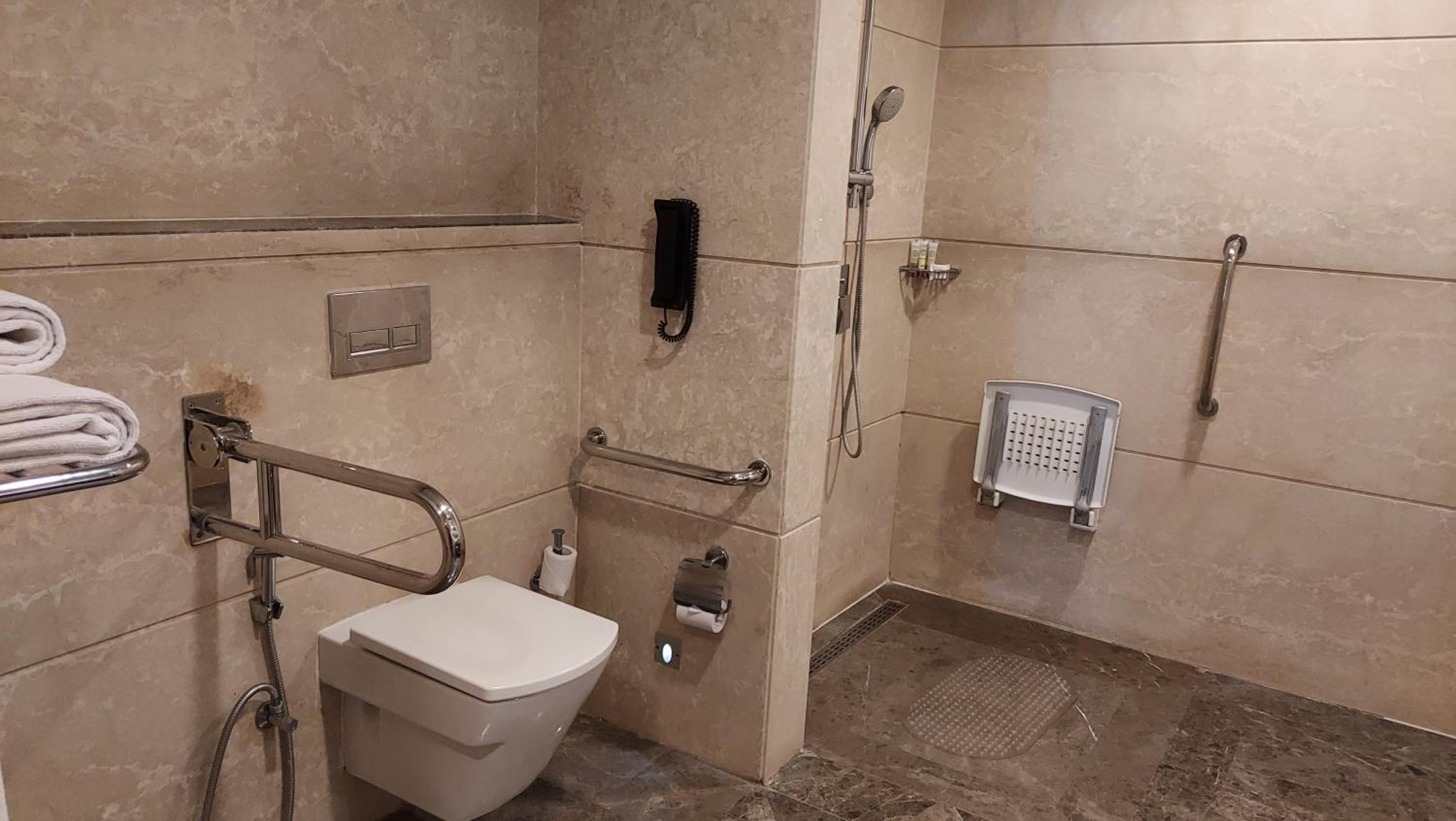 Classic King Room with Pool View - Disability Access: 20% off on food,soft beverages, laundry & local transportation(upto 10 km); enjoy 90-min spa at 60mins spa price; BOGO offer on select beverages(5–8 pm) at Connexions Bar