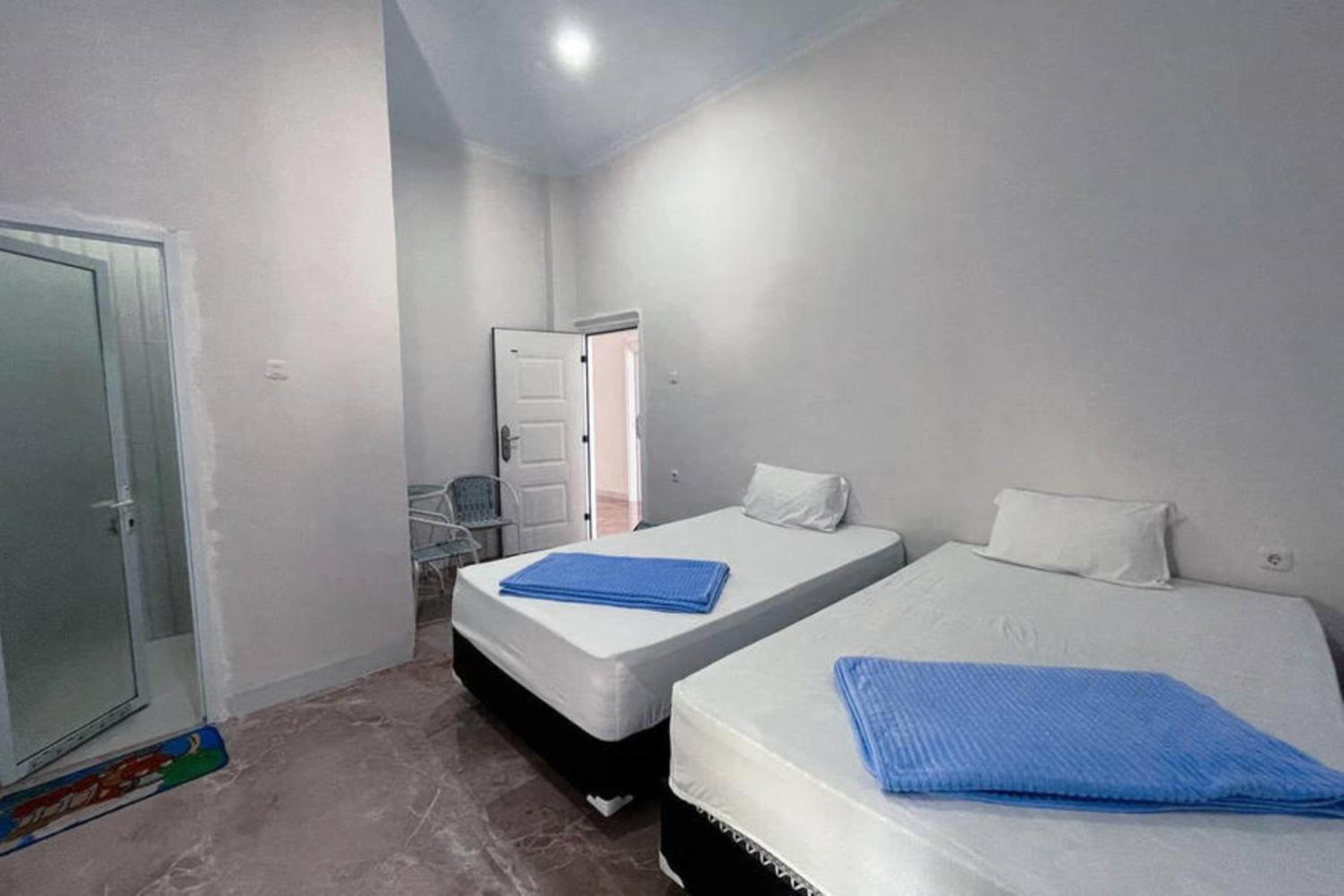 Twin Room - Photo 1