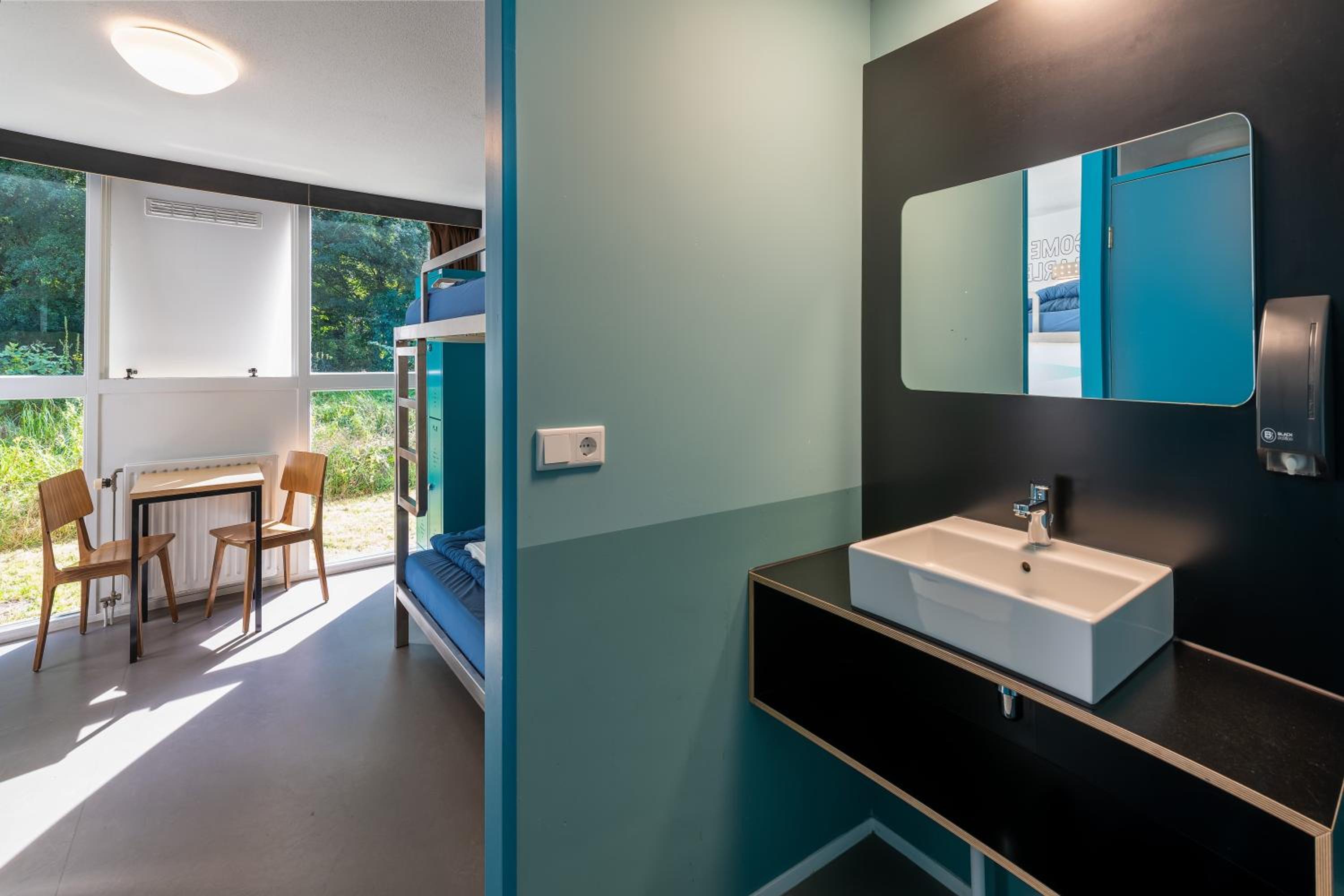 Budget Twin with Bunk Beds and Private Bathroom with Shower - Photo 6