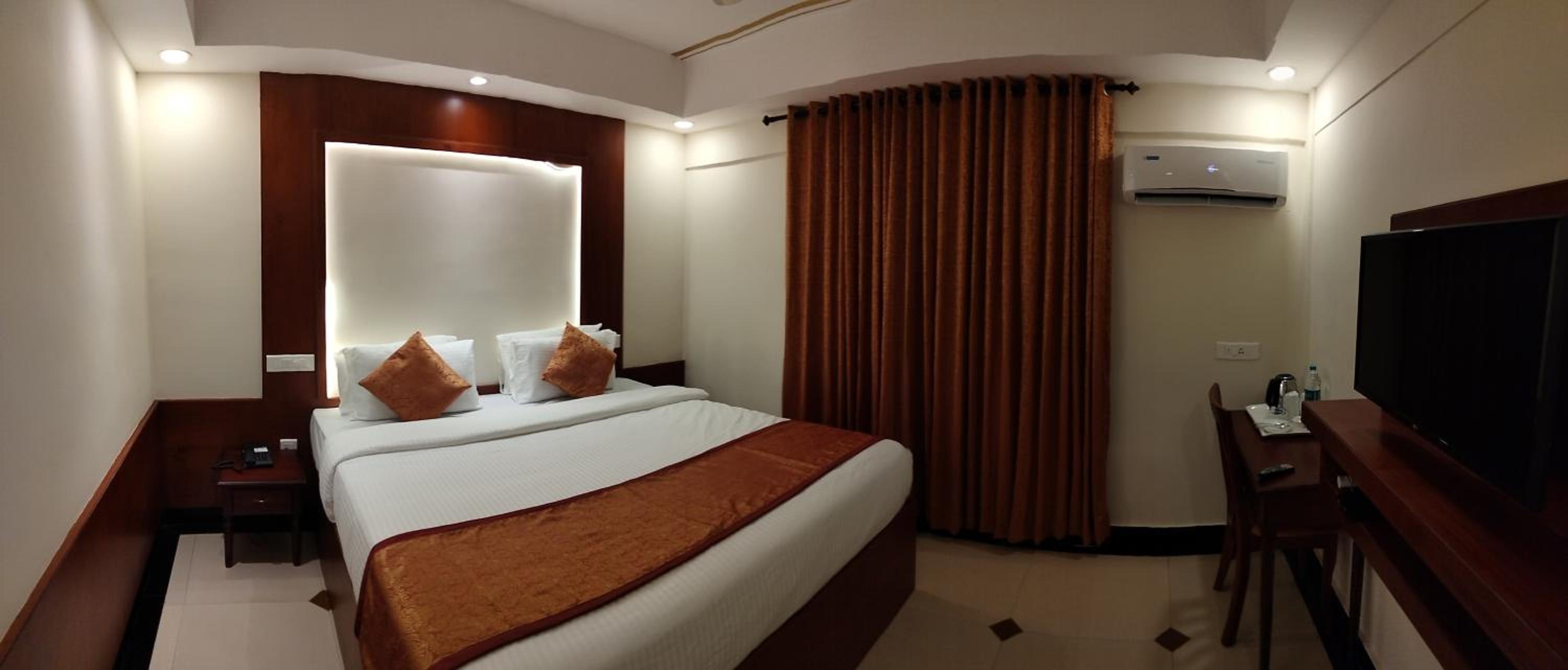 Deluxe Room - Photo 1