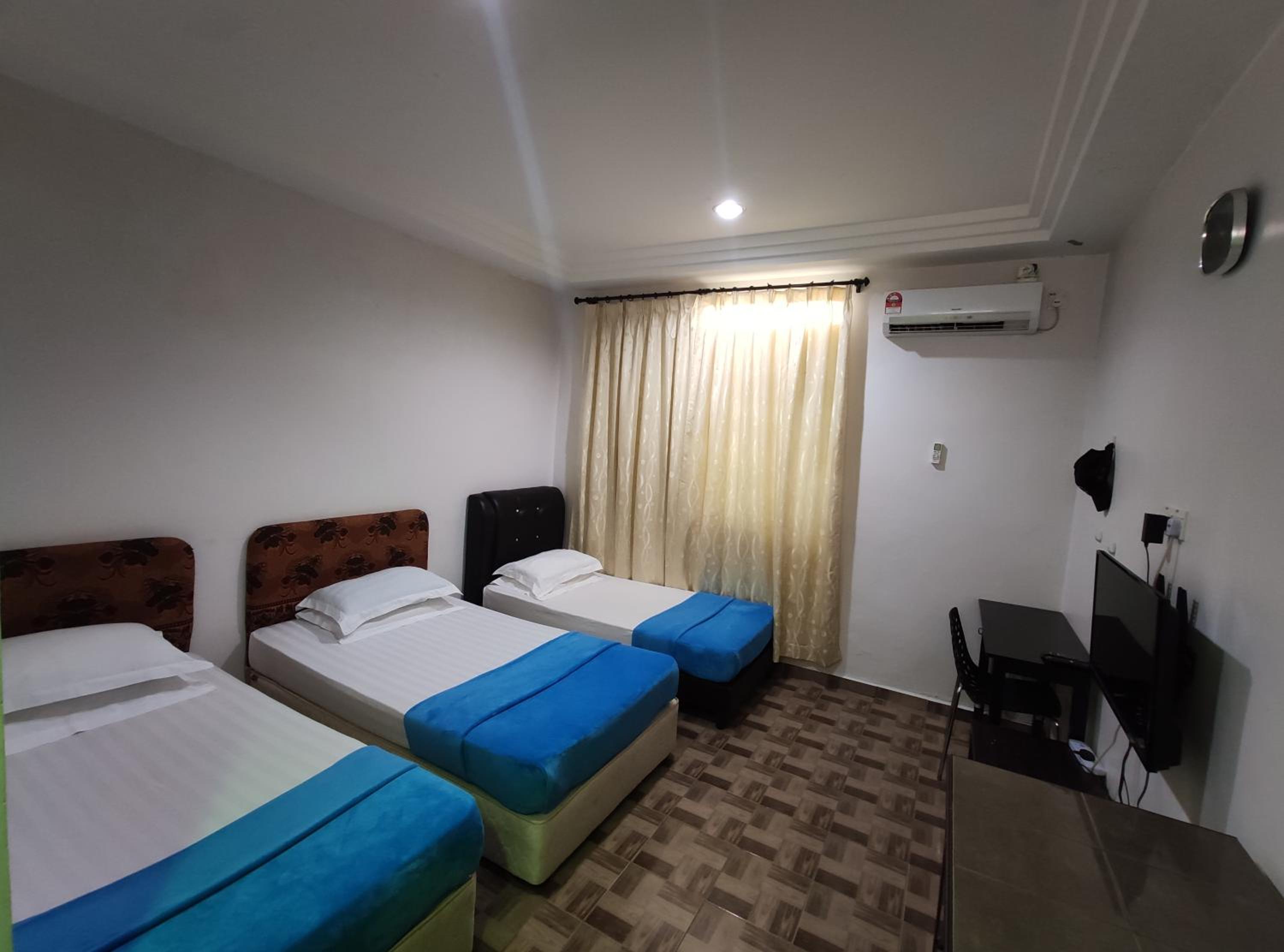 Deluxe Triple Room - Photo 2