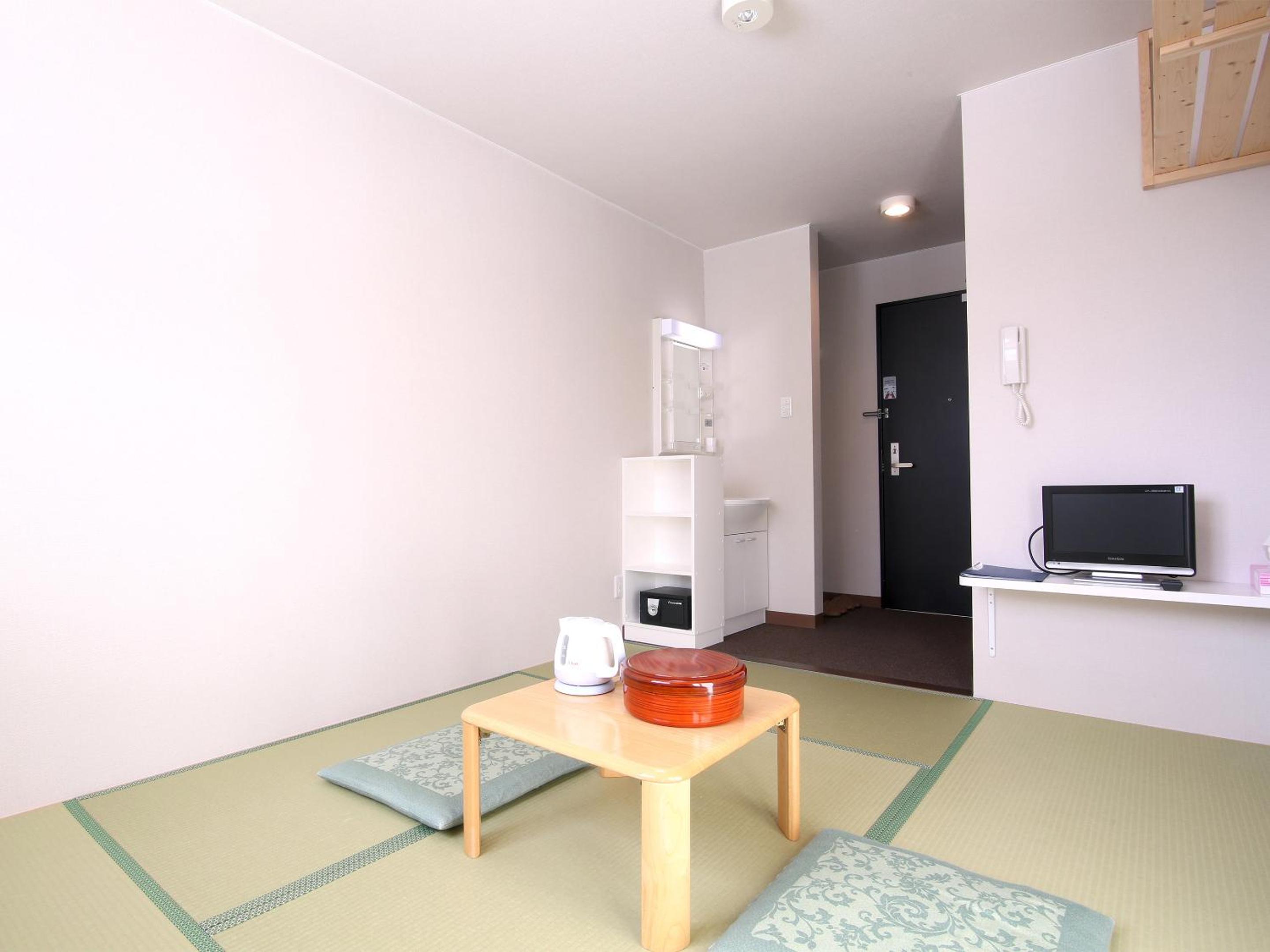 Quadruple Room with Private Bathroom